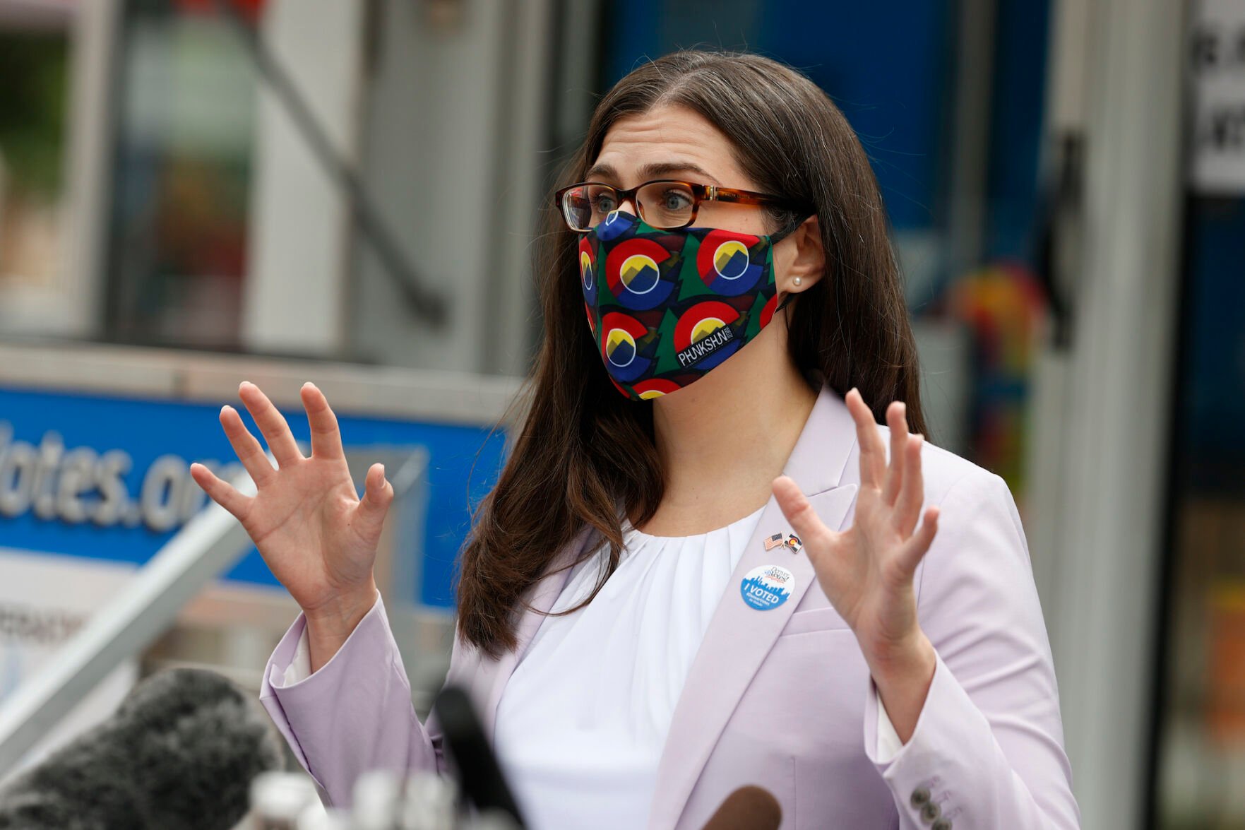 In this file photo, Colorado Secretary of State Jena Griswold wears a face mask at a mobile location in the Swansea neighborhood Tuesday, June 30, 2020, in downtown Denver. The Democrat is running for a second term in 2022. ((AP Photo/David Zalubowski))