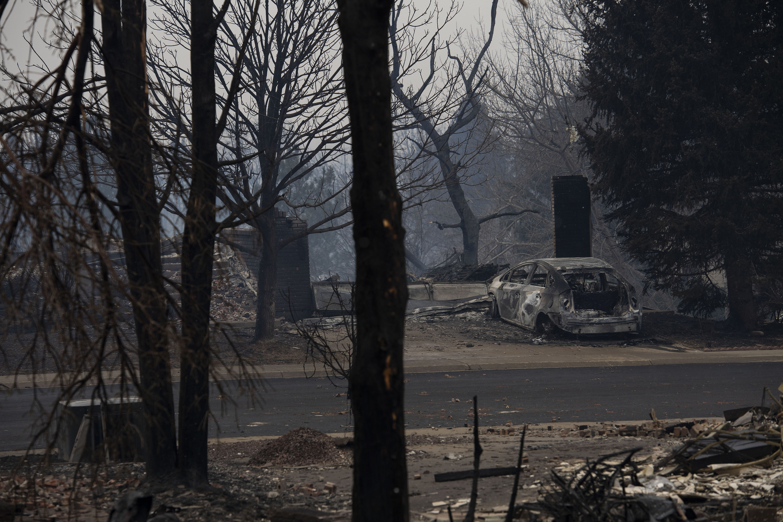 The aftermath of the Marshall fire in Louisville, Colo., on Friday, Dec. 31, 2021. The Marshall fire ripped through Boulder County fulled by high-winds on Thursday, destroying over 500 homes. The number of destroyed homes will likely increase as approximately 35,000 people were evacuated in Louisville and Superior.(Chancey Bush/ The Gazette) (Chancey Bush/ The Gazette)