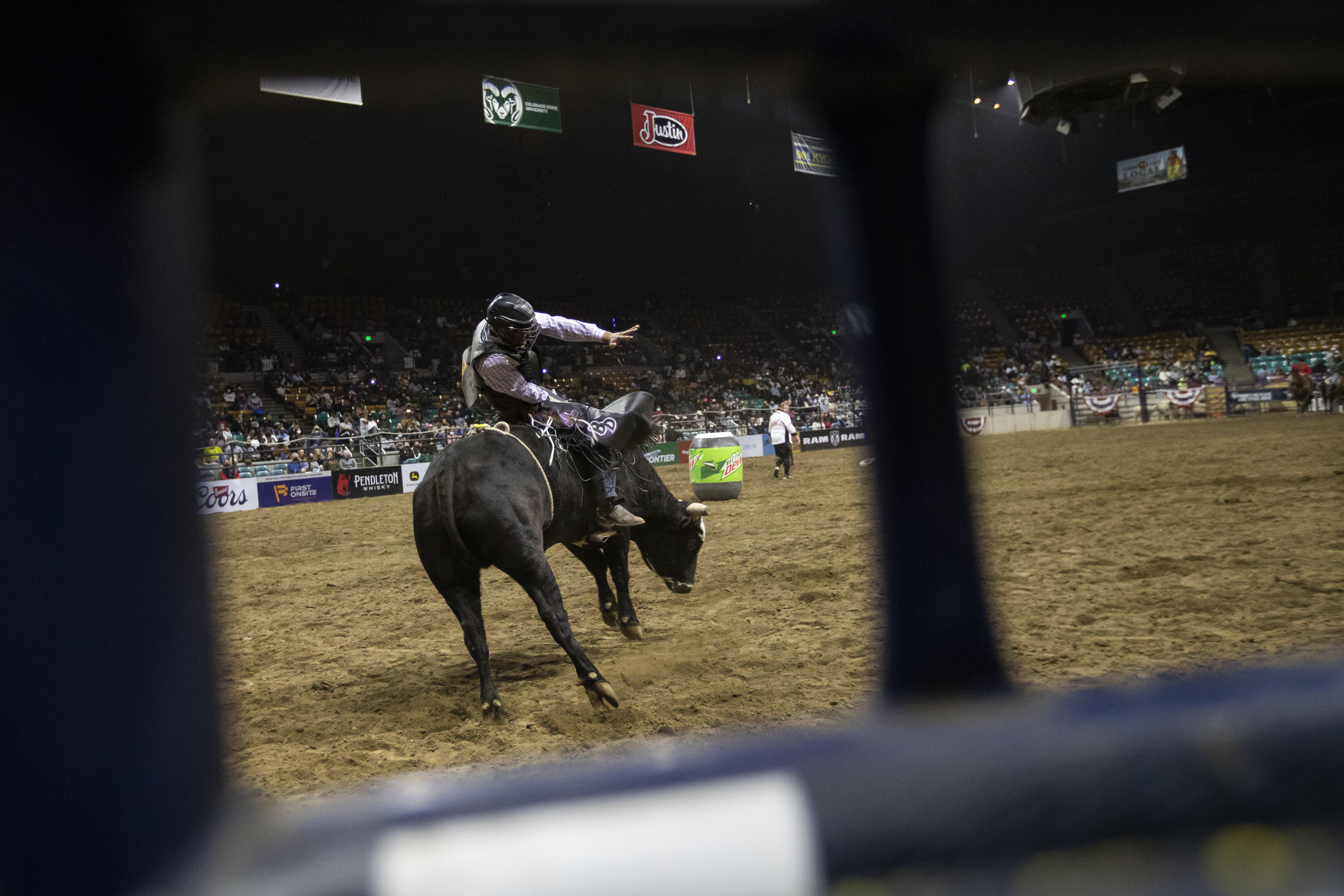 Bullrider Blaine Devers attempts to hang onto bull Rico during the African-American Heritage Rodeo at the National Western Stock Show on Monday, Jan. 17, 2022, in Denver, Colo. (Timothy Hurst/The Gazette) (Timothy Hurst)