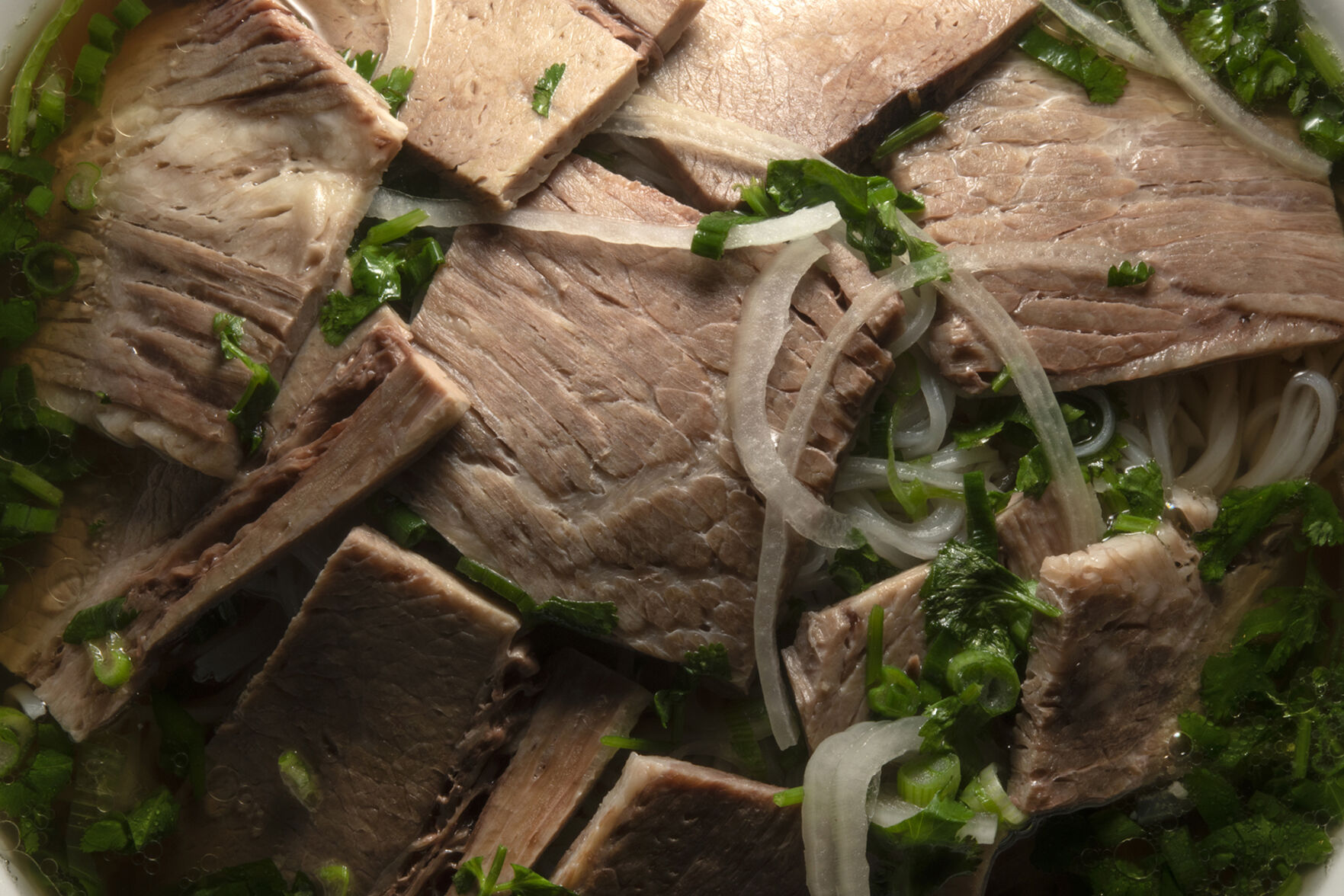 A pho bowl with brisket as photographed this month at Zomo Asian American Eatery, 3457 S. Broadway in Englewood. (Jeff Kearney, special to the gazette)
