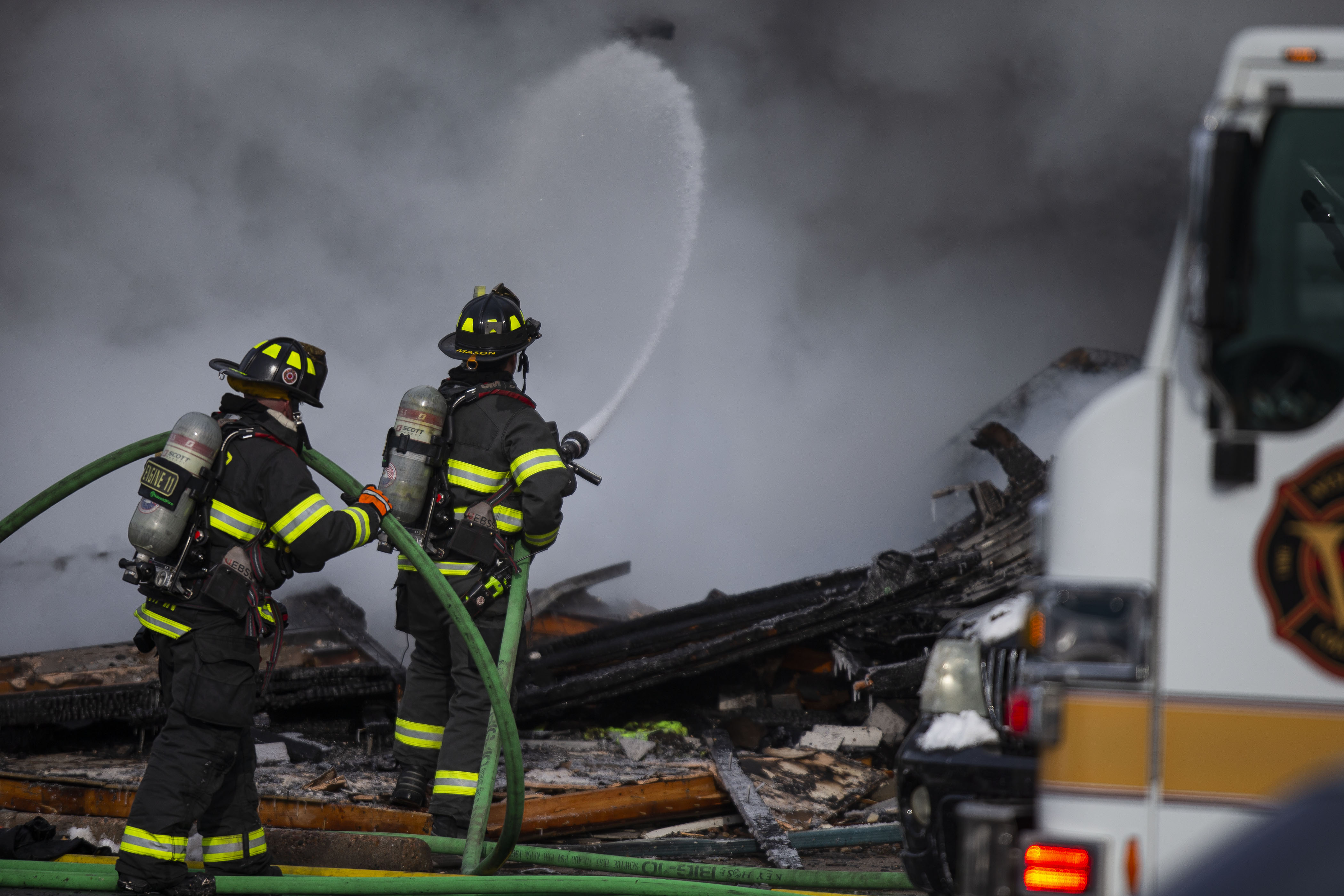 Firefighters work to extinguish a fire after a suspected explosion at the Stratus Townhomes on Wednesday, Feb. 23, 2022, in Westminster, Colo. (Timothy Hurst/The Denver Gazette) (Timothy Hurst)