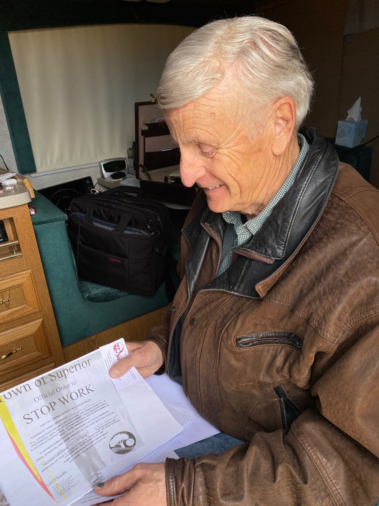 On Jan. 24, Paul Williamson had to stop cleaning up his property because he neglected to get the proper permits. Boulder County has strict rules for citizens who opt out of FEMA's Private Property Debris Removal Program. (Carol McKinley)