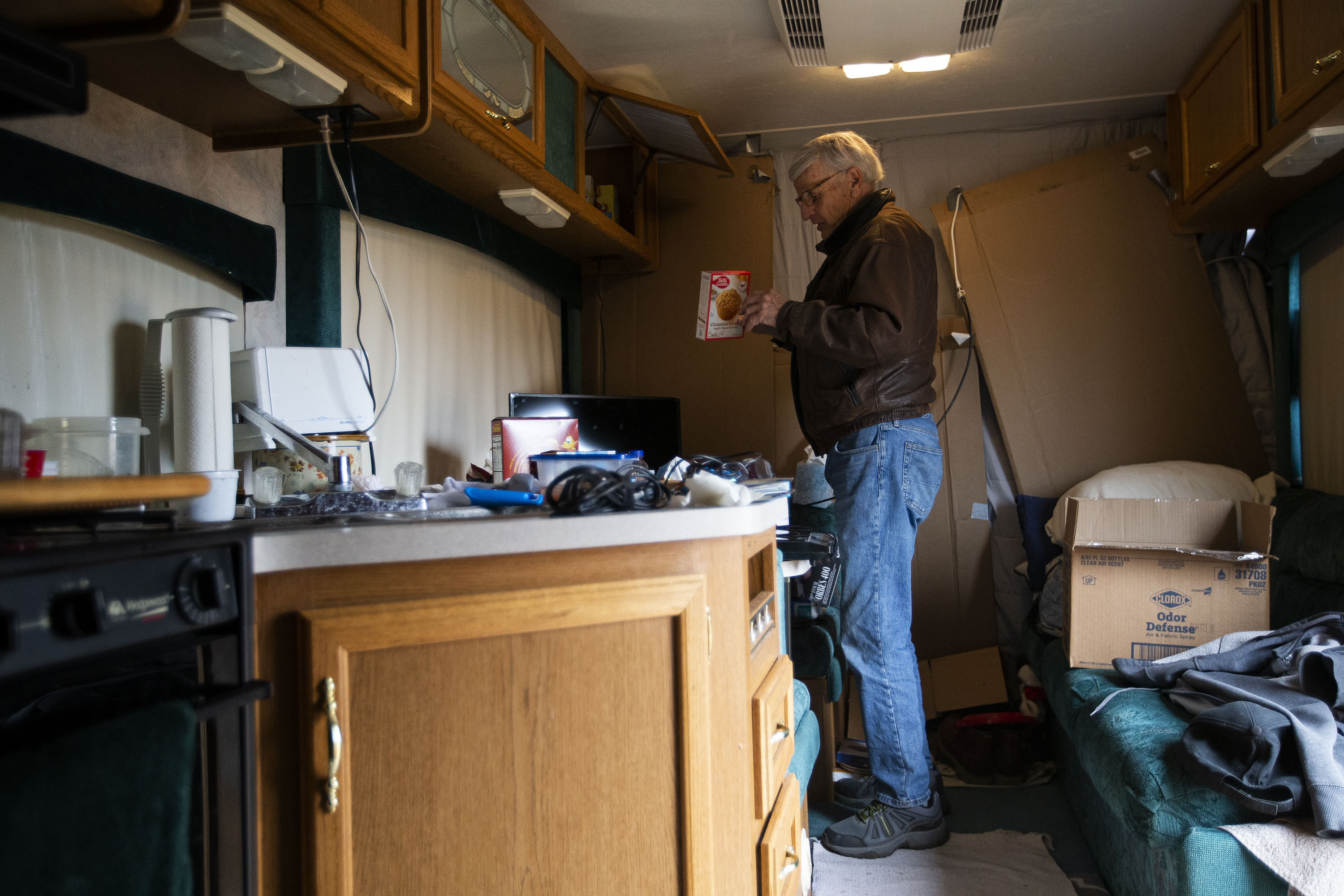 Superior resident Paul Williamson packs up food items in the camper that he’s been living in on his property in the Original Town neighborhood on Wednesday, March 16, 2022, in Superior, Colo. Williamson is planning to move into an apartment this Friday, but has been staying in the camper owned by his daughter. (Timothy Hurst/The Denver Gazette) (Timothy Hurst)