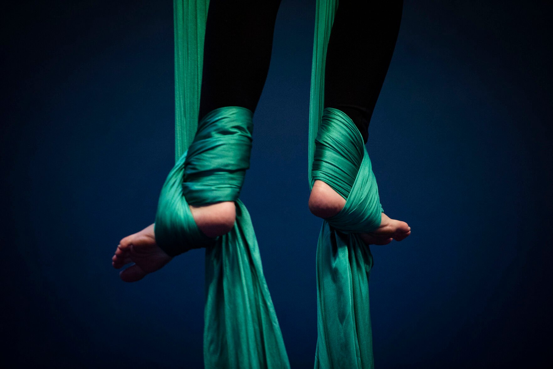 Emma Huang, 16, during a teen intermediate aerial silk class at the Urban Cirque studio in Colorado Springs on Tuesday, March 15, 2022. Owner Katrina Diaz opened her studio in January, where she shares her passion of circus-style fitness with teens and adults, teaching the art of silks, hoops and aerial fitness ranging from beginner to intermediate classes. (Chancey Bush/ The Gazette)