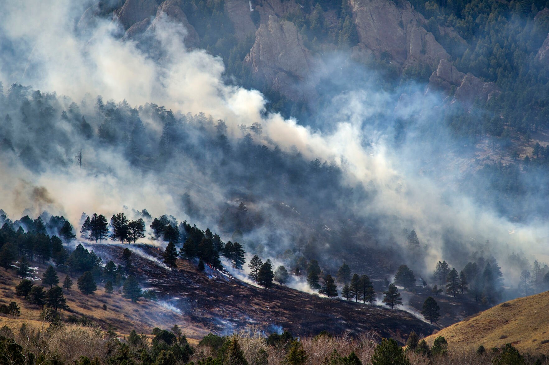 Smoke from the NCAR Fire obscures the foothills on March 26, 2022, in Boulder, Colo. (Jacob Byk/For The Denver Gazette)
