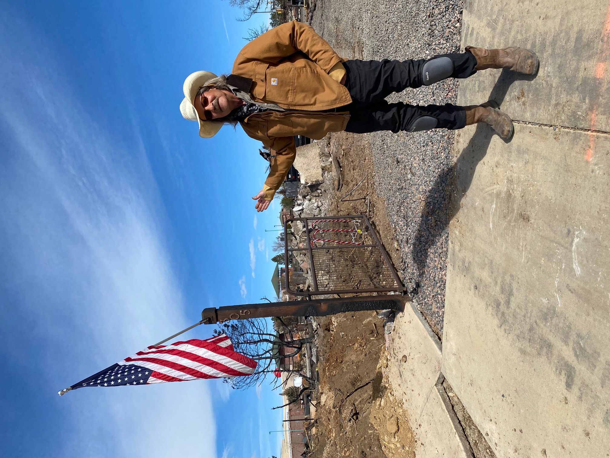 Ross Morgan followed Williamson's lead and started cleanup on his three lot parcel himself. He has hired a contractor to haul away the remnants of the family home which he built to envelope a 1910 miner's camp cabin. (Carol McKinley)