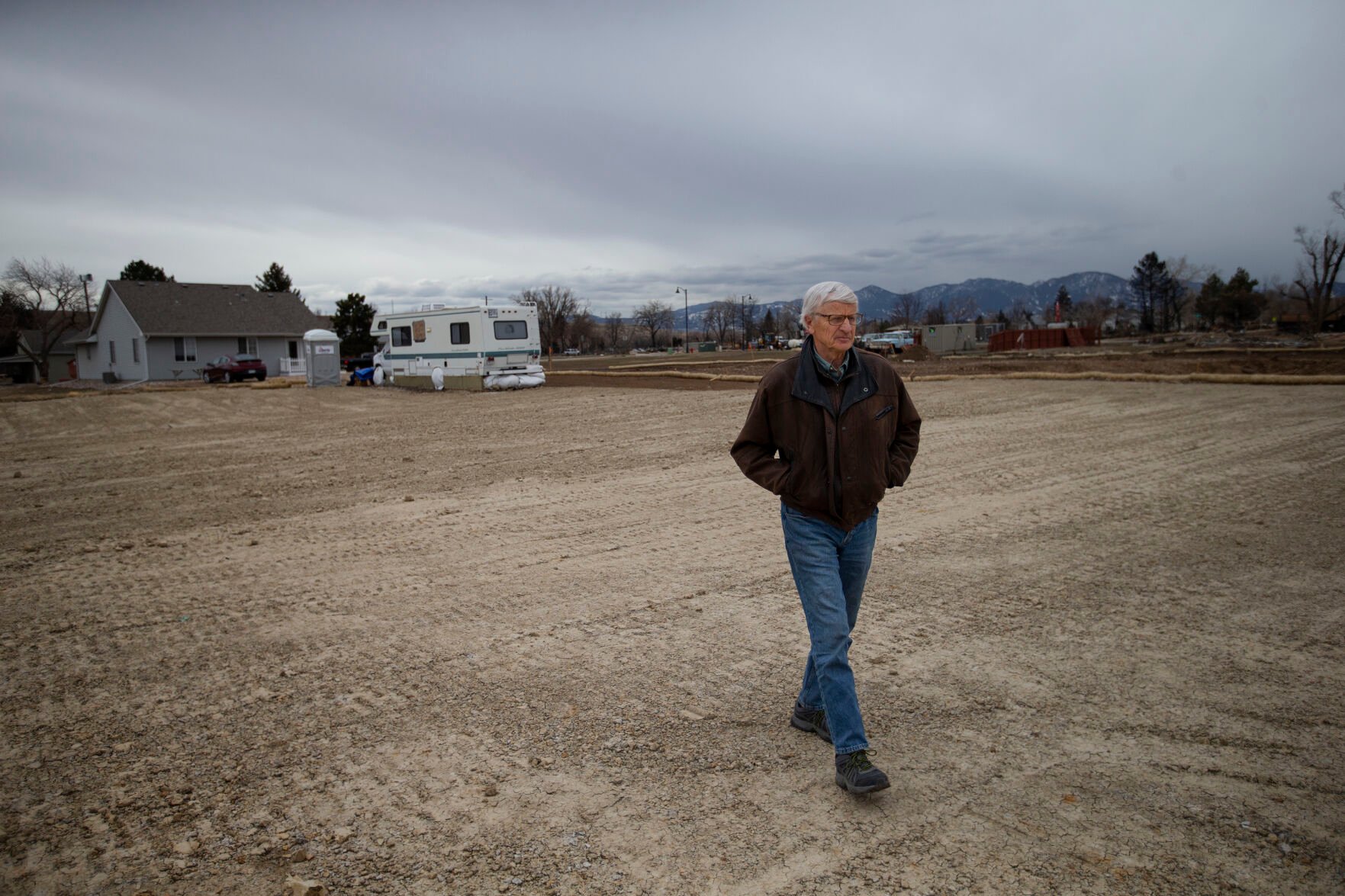 Superior resident Paul Williamson walks to the far end of his cleared property in the Original Town neighborhood on Wednesday, March 16, 2022, in Superior, Colo. (Timothy Hurst/The Denver Gazette) (Timothy Hurst)