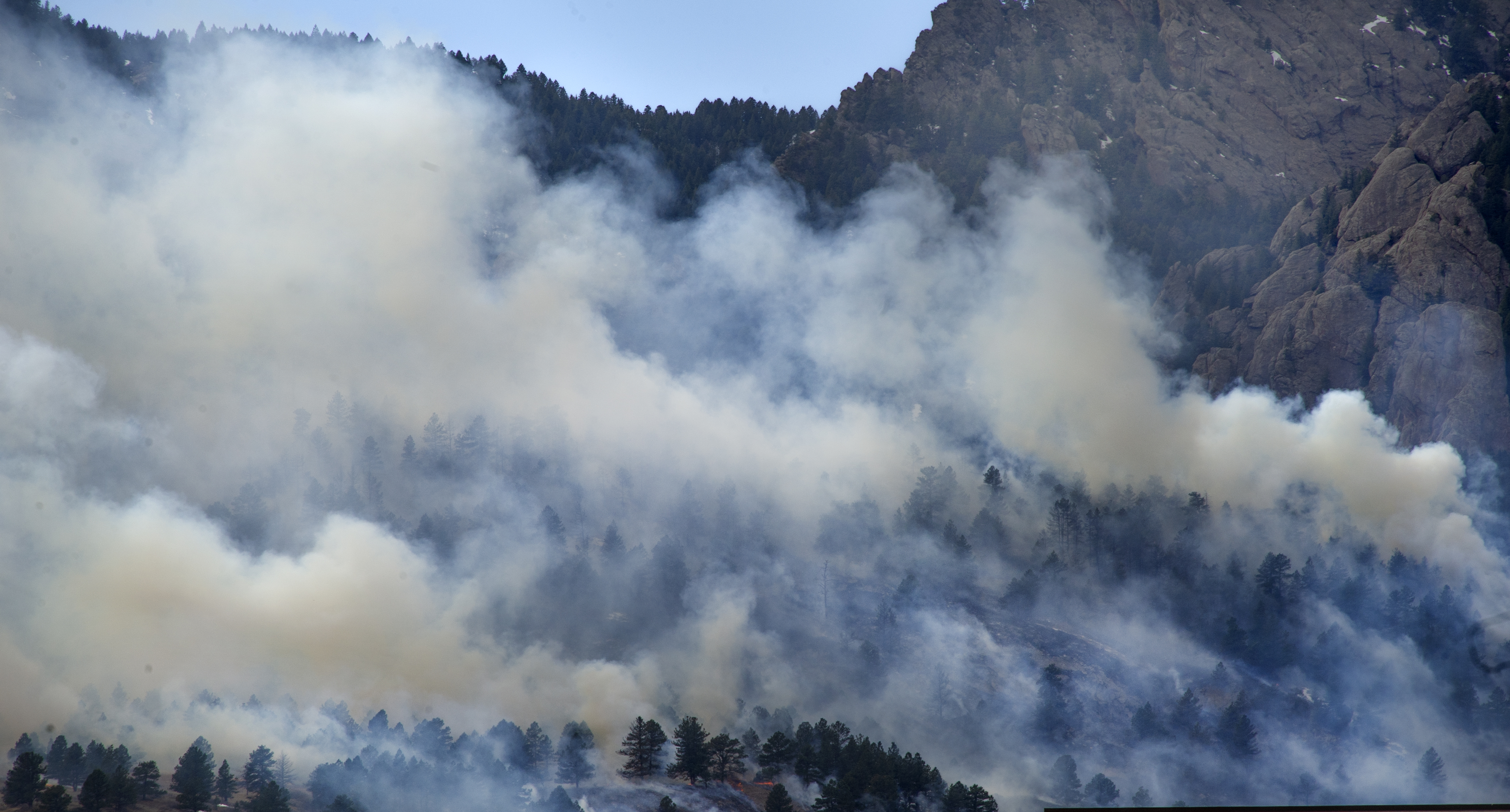 Smoke from the NCAR Fire obscures the foothills on March 26, 2022, in Boulder, Colo. Jacob Byk/For The Denver Gazette