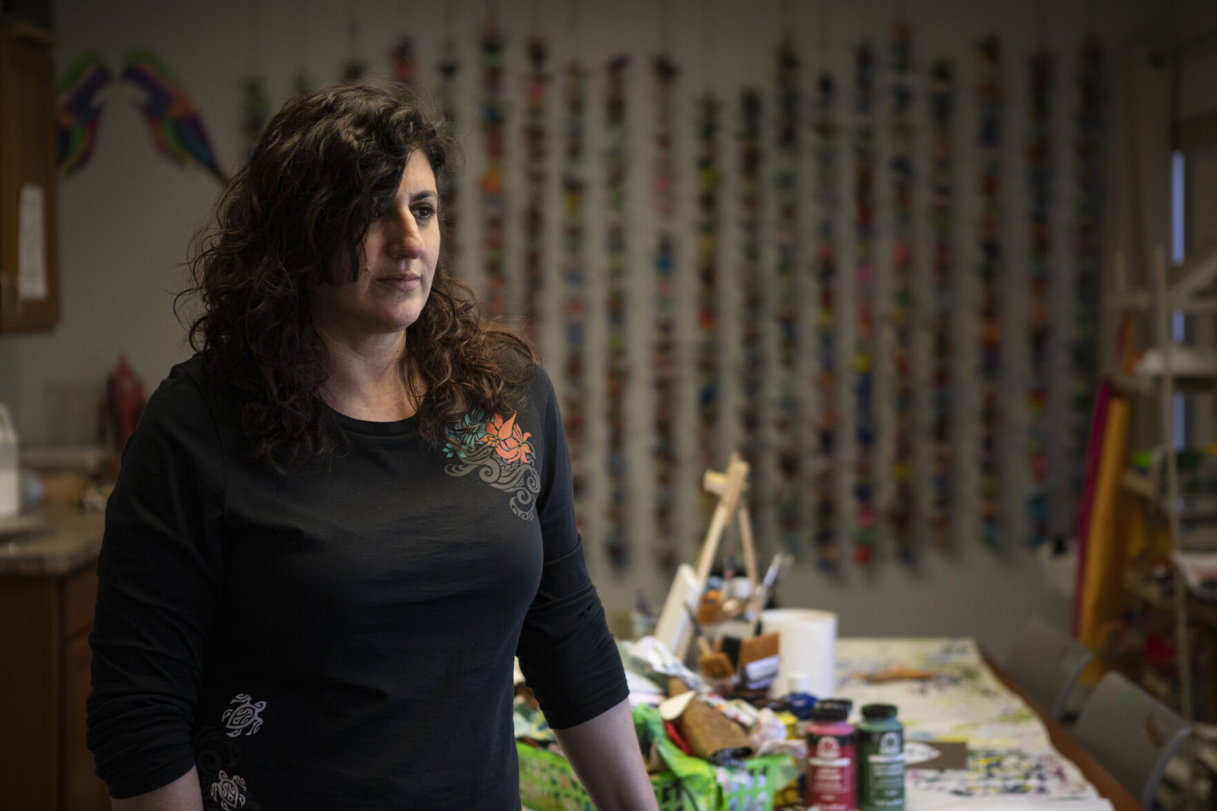 Julie Ratinoff, MA, LPC, ATR-P, an art based clinician serving as the interim manager of the #BoulderStrong Resource Center, poses for a portrait in the activity room of the resource center on Friday, March 18, 2022, in Boulder, Colo. (Timothy Hurst/The Denver Gazette) (Timothy Hurst)