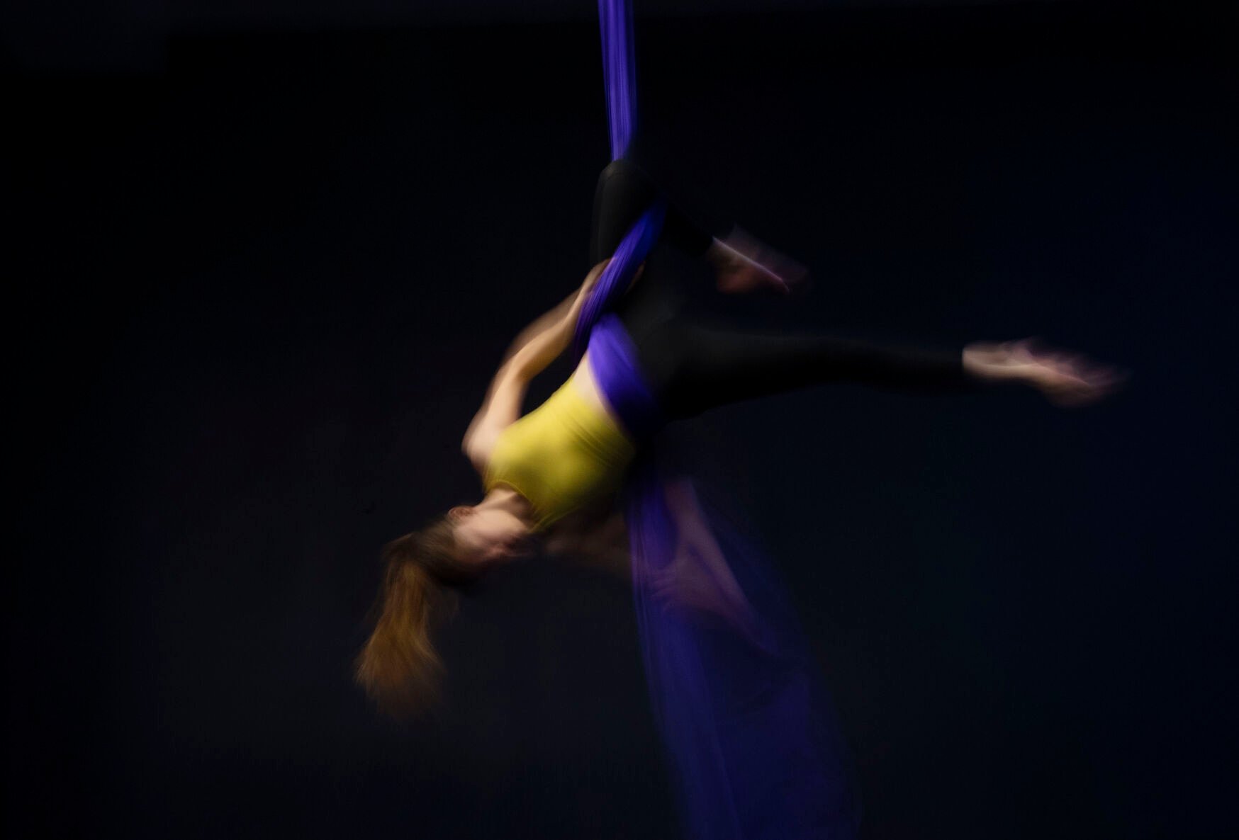 Adalyn Brown, 12, practices techniques during a teen intermediate aerial silk class at the Urban Cirque studio in Colorado Springs on Tuesday, March 15, 2022. Owner Katrina Diaz opened her studio in January, where she shares her passion of circus-style fitness with teens and adults, teaching the art of silks, hoops and aerial fitness ranging from beginner to intermediate classes. (Chancey Bush /The Gazette) (Chancey Bush/ The Gazette)