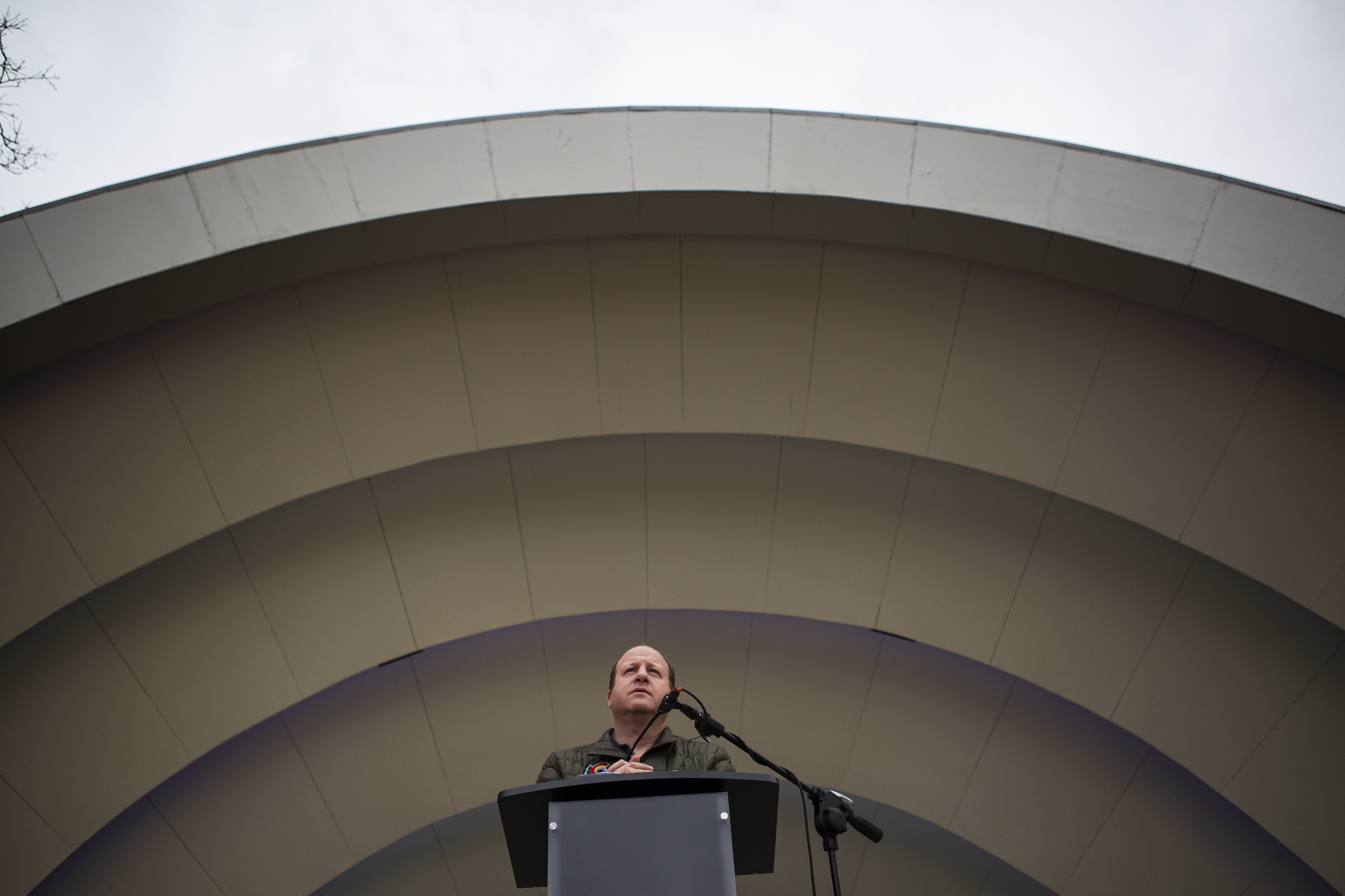 Gov. Jared Polis speaks during a Communitywide Day of Remembrance gathering at the Glen Huntington Bandshell on Tuesday, March 22, 2022, in Boulder, Colo. (Timothy Hurst/The Denver Gazette) (Timothy Hurst)