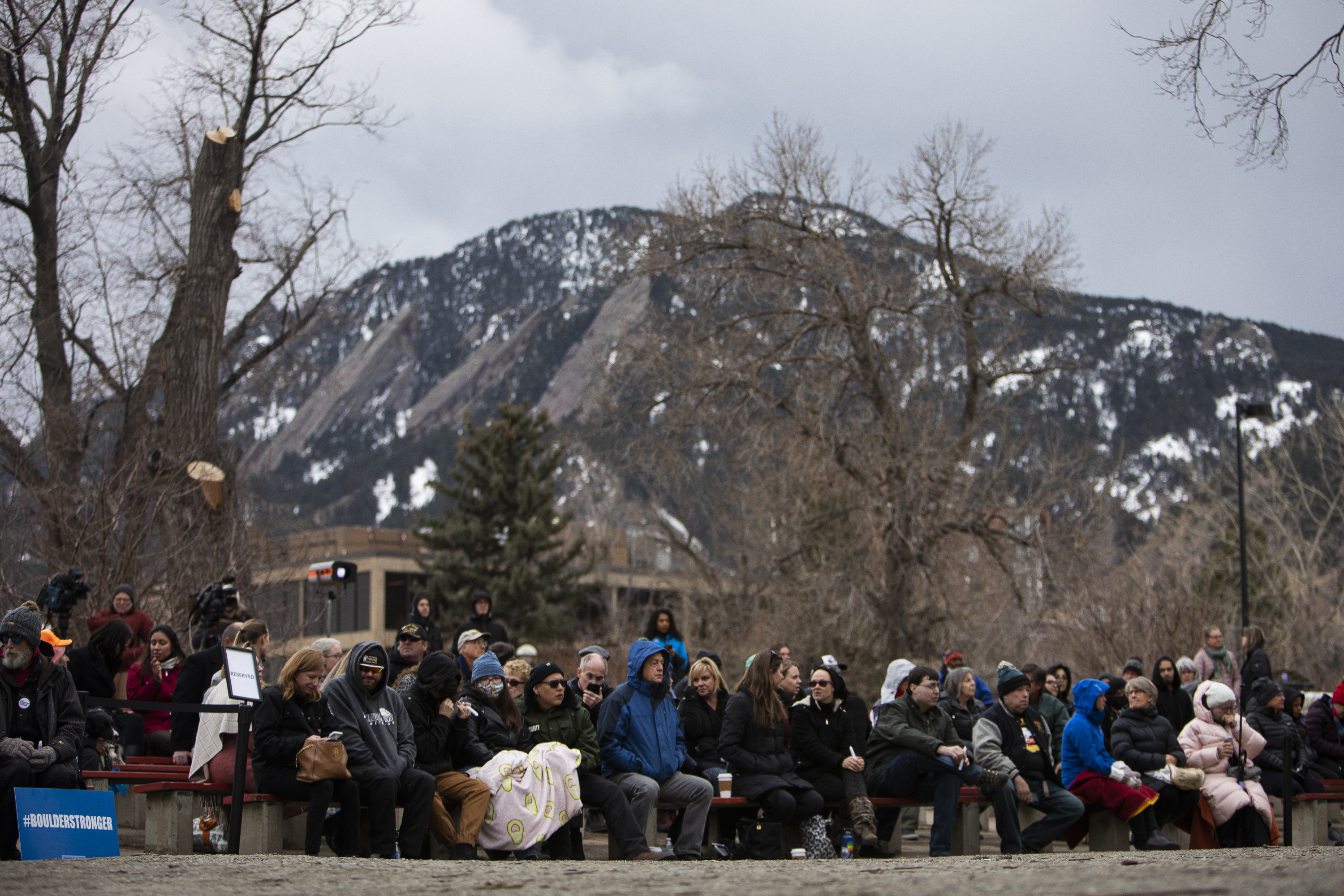 Community members gather for a Communitywide Day of Remembrance gathering at the Glen Huntington Bandshell on Tuesday, March 22, 2022, in Boulder, Colo. (Timothy Hurst/The Denver Gazette) (Timothy Hurst)