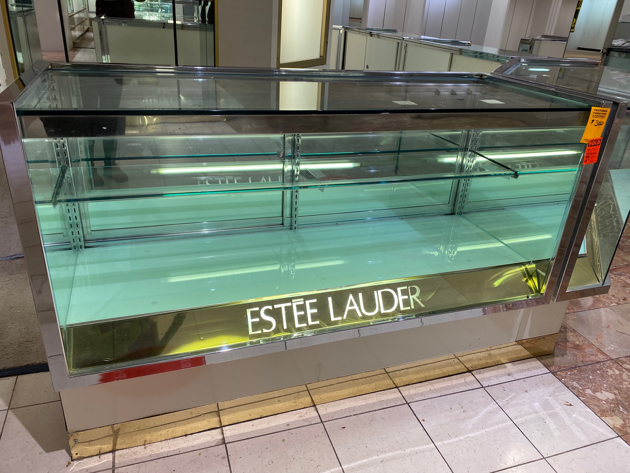This Estee Lauder glass makeup counter sold for $300. (Carol McKinley, The Denver Gazette)