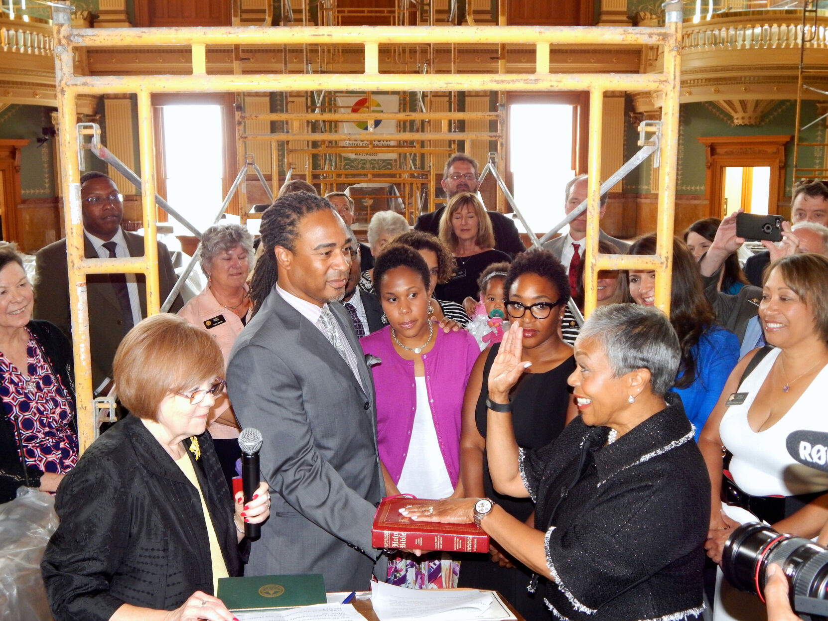 Now-Sen. Janet Buckner swearing into the Colorado House of Representatives after she was unanimously elected to succeed her late husband, former Rep. John Buckner, in July 2015. (janetbuckner.com)