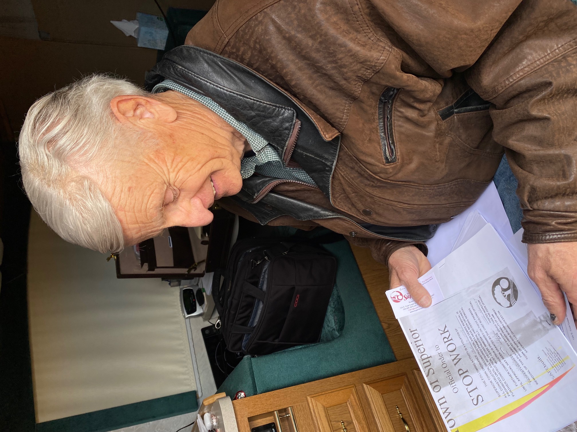 On Jan. 24, Paul Williamson had to stop cleaning up his property because he neglected to get the proper permits. Boulder County has strict rules for citizens who opt out of FEMA's Private Property Debris Removal Program. (Carol McKinley)