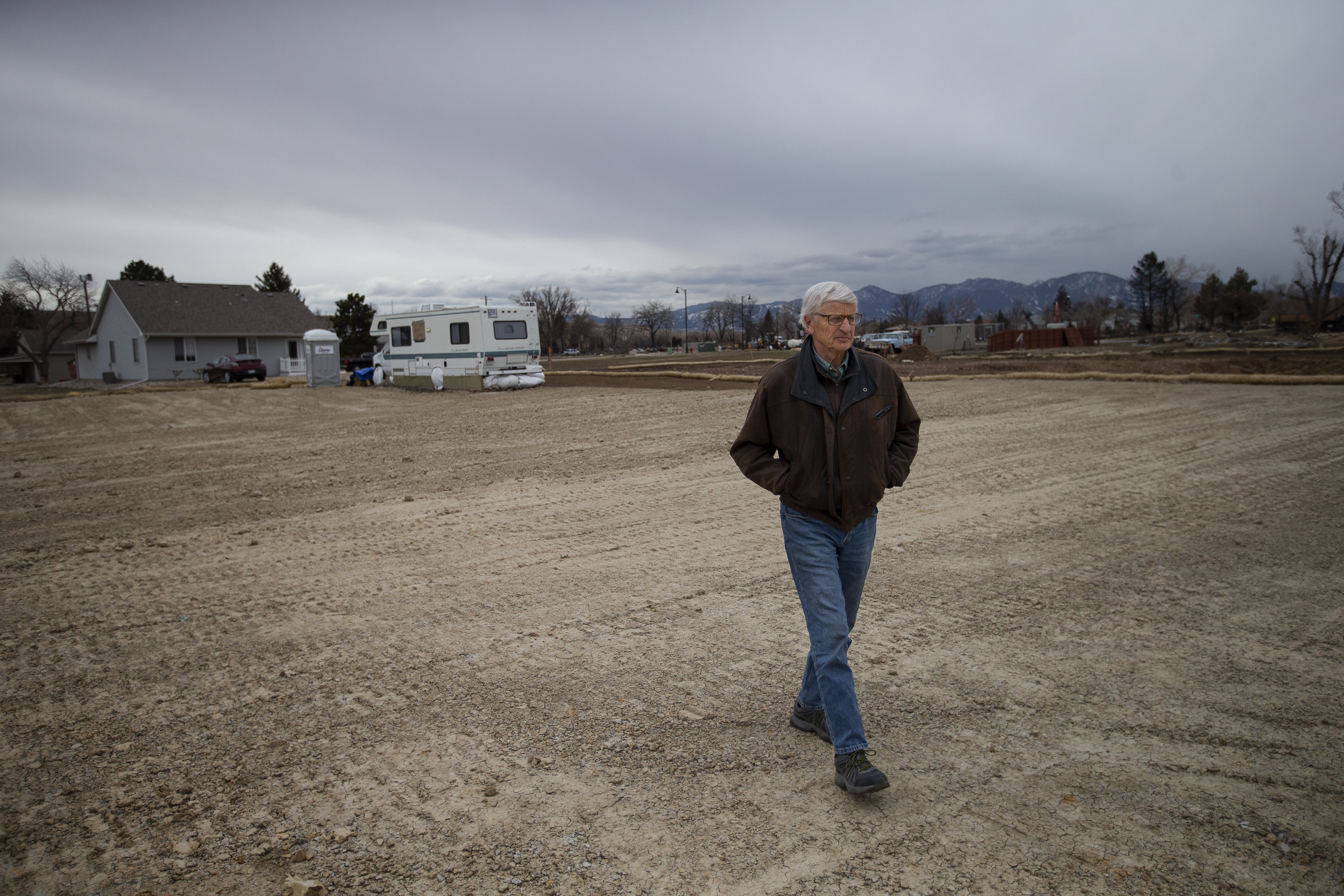 Superior resident Paul Williamson walks to the far end of his cleared property in the Original Town neighborhood on Wednesday, March 16, 2022, in Superior, Colo. (Timothy Hurst/The Denver Gazette) (Timothy Hurst)
