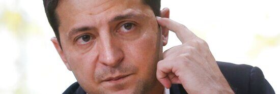 Zelensky answers Putin’s rally with warning, plea for peace