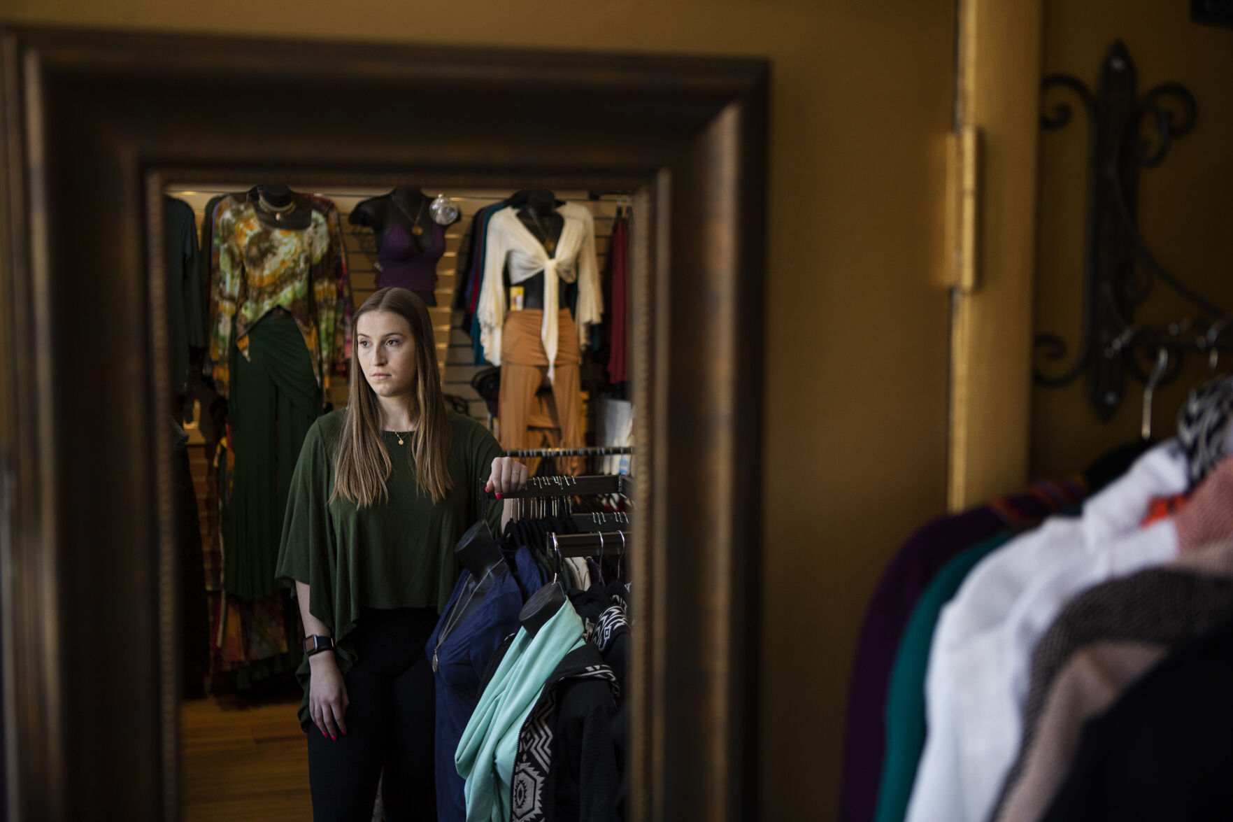 Umba employee Matisse Molina, who worked with and was friends with Tralona “Lonna” Bartkowiak, who was one of ten victims in a mass shooting at the King Supers grocery store nearly a year ago and was the owner of Umba, poses for a portrait in the store on Friday, March 18, 2022, in Boulder, Colo. (Timothy Hurst/The Denver Gazette) (Timothy Hurst)