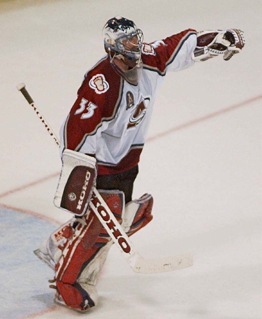 Colorado Avalanche goalie Patrick Roy celebrates his team's 8-1 victory over the Florida Panthers in Game 2 of the Stanley Cup Finals Thursday, June 6, 1996, in Denver. The Avalanche lead the best-of-seven series 2-0. (AP Photo/Ed Andrieski) (ED ANDRIESKI)
