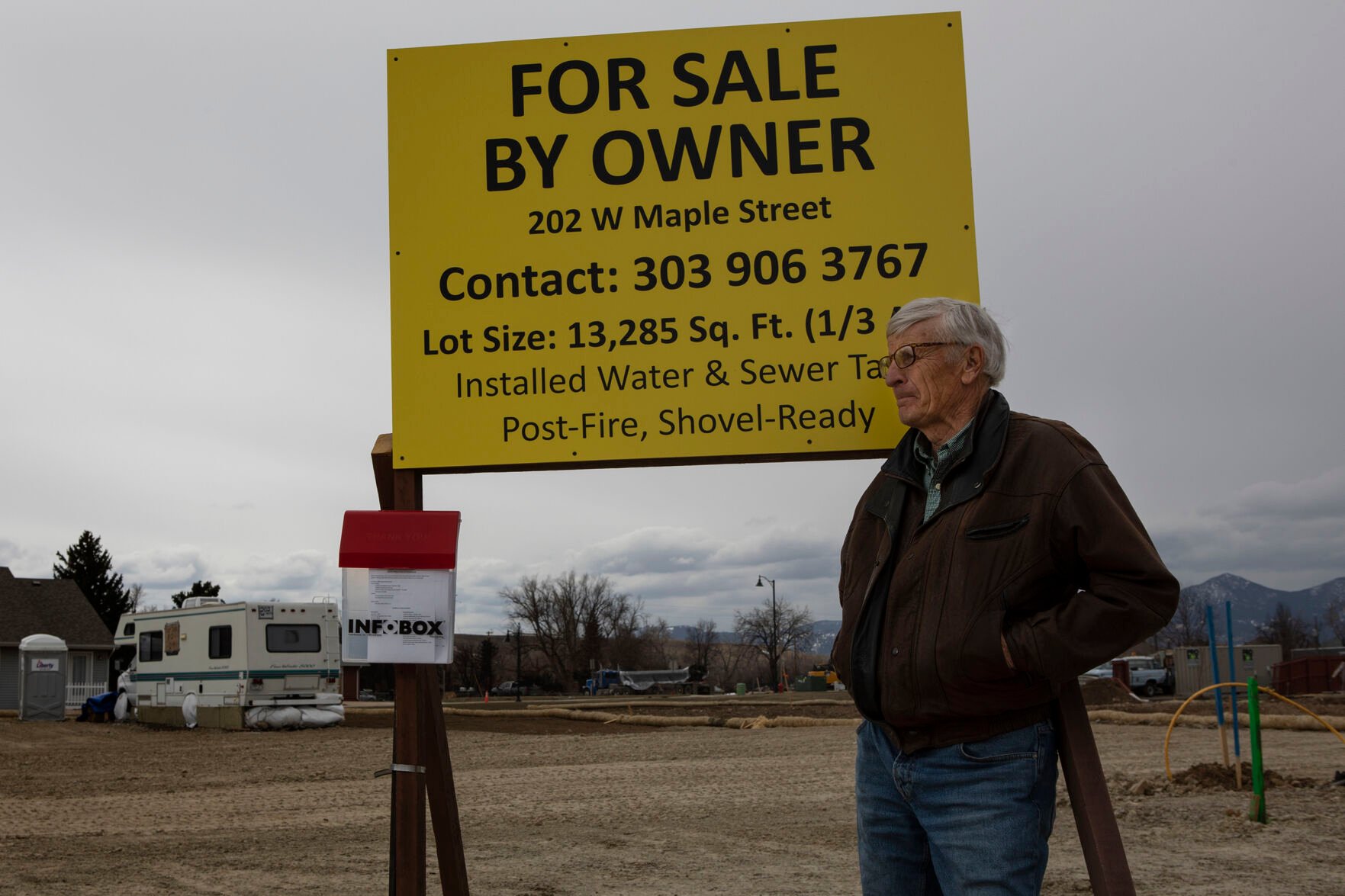 Superior resident Paul Williamson poses for a portrait next to the sign he made to advertise the sale of his property in the Original Town neighborhood on Wednesday, March 16, 2022, in Superior, Colo. (Timothy Hurst/The Denver Gazette) (Timothy Hurst)