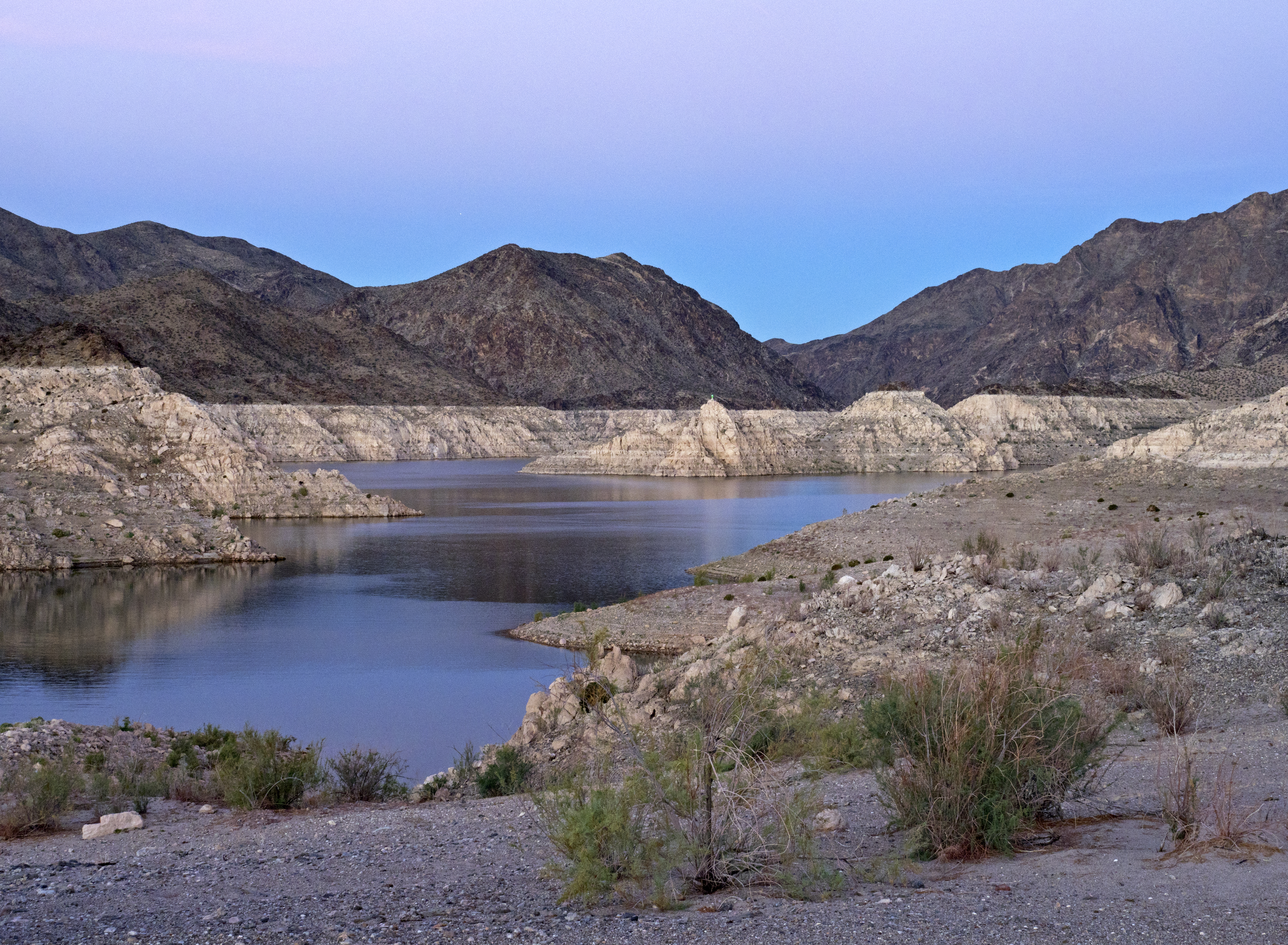 The Earth's shadow rises at dawn above the landscape near Channel Island at the head of Virgin Canyon in Lake Mead in the Lake Mead National Recreation Area on the Arizona-Nevada border (Photo from Arizona) (Colleen Miniuk-Sperry)