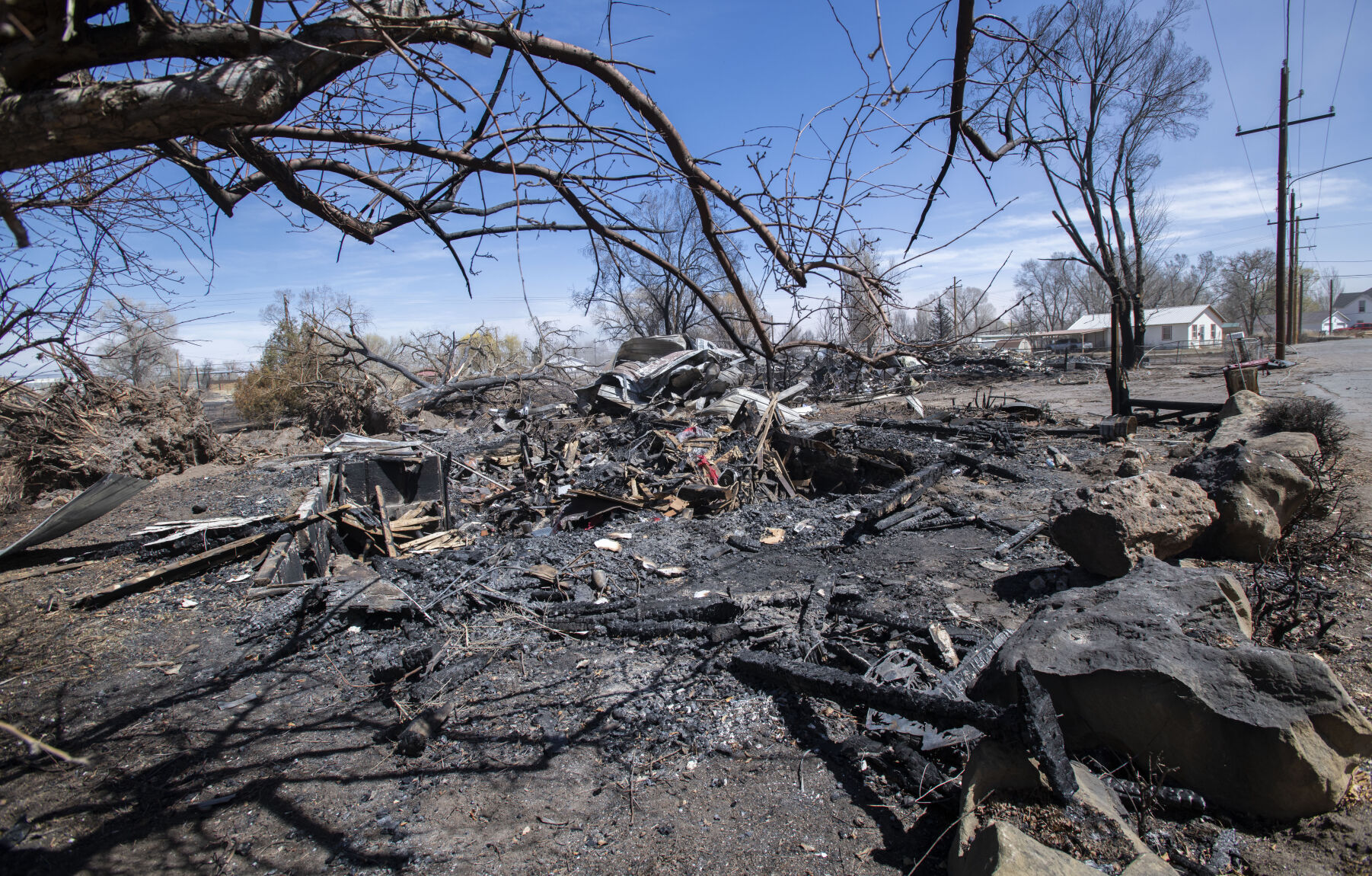 The foundation and ashes is all that remains of a home on Newcomb Street in Monte Vista Friday, after a fire fueled by high winds Wednesday burned 17 structures and displaced six families. (Christian Murdock, The Gazette)
