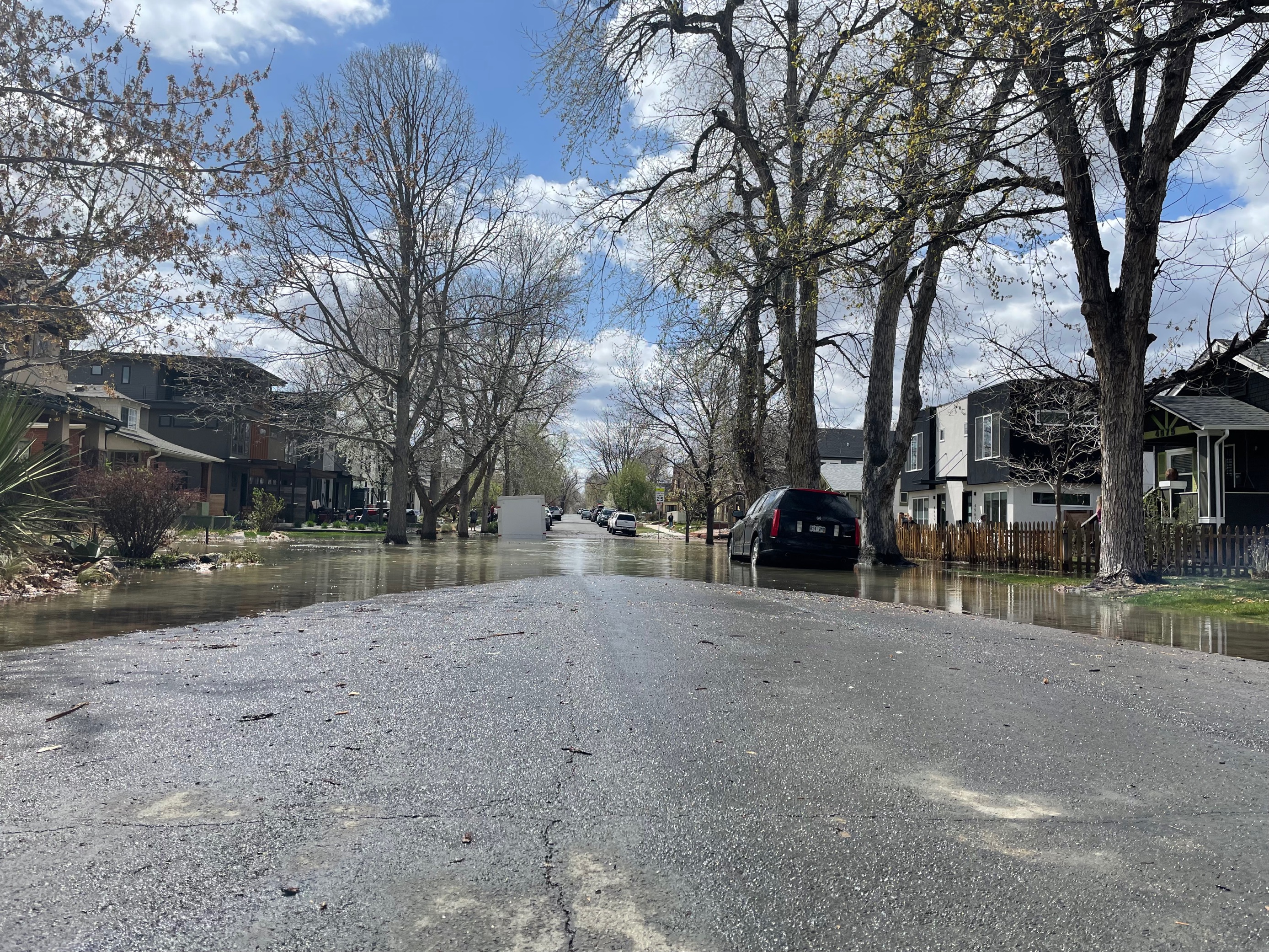 Parts of a street are flooded from a water main break in the Berkeley neighborhood that occurred Sunday, April 24, 2022. (Lindsey Toomer, Denver Gazette) (Lindsey Toomer, Denver Gazette)