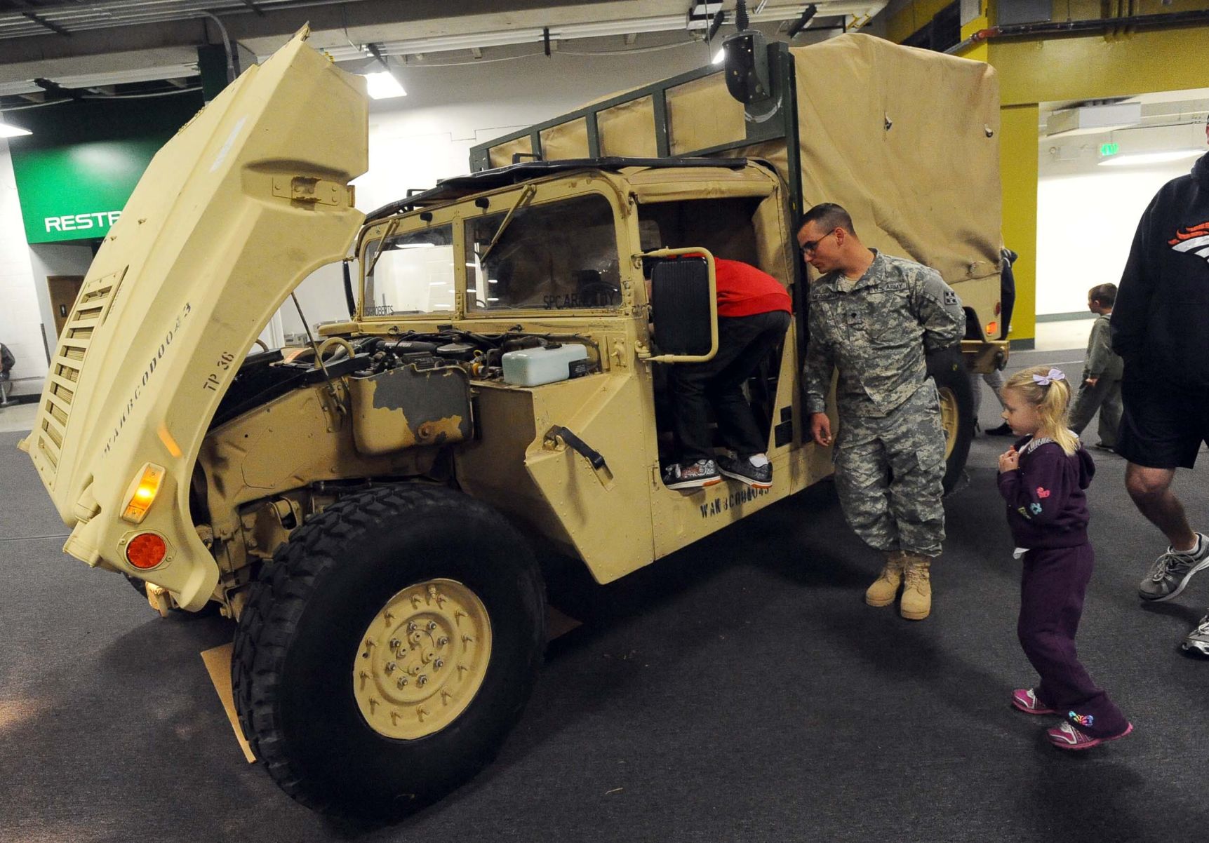 Children explore a U.S. Army Humvee. Gazette file photo. (Christian Murdock)