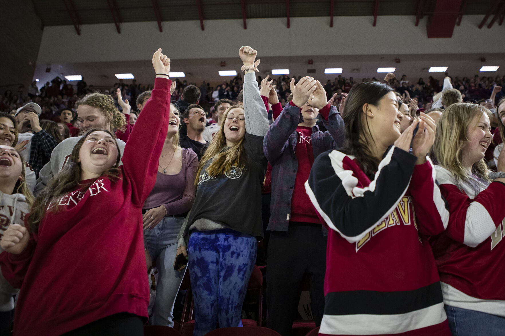 University of Denver students cheer for the Men’s Hockey Team during the 2022 National Championship Celebration on Tuesday, April 12, 2022, at Magness Arena in Denver, Colo. (Timothy Hurst/The Denver Gazette) (Timothy Hurst, The Denver Gazette)