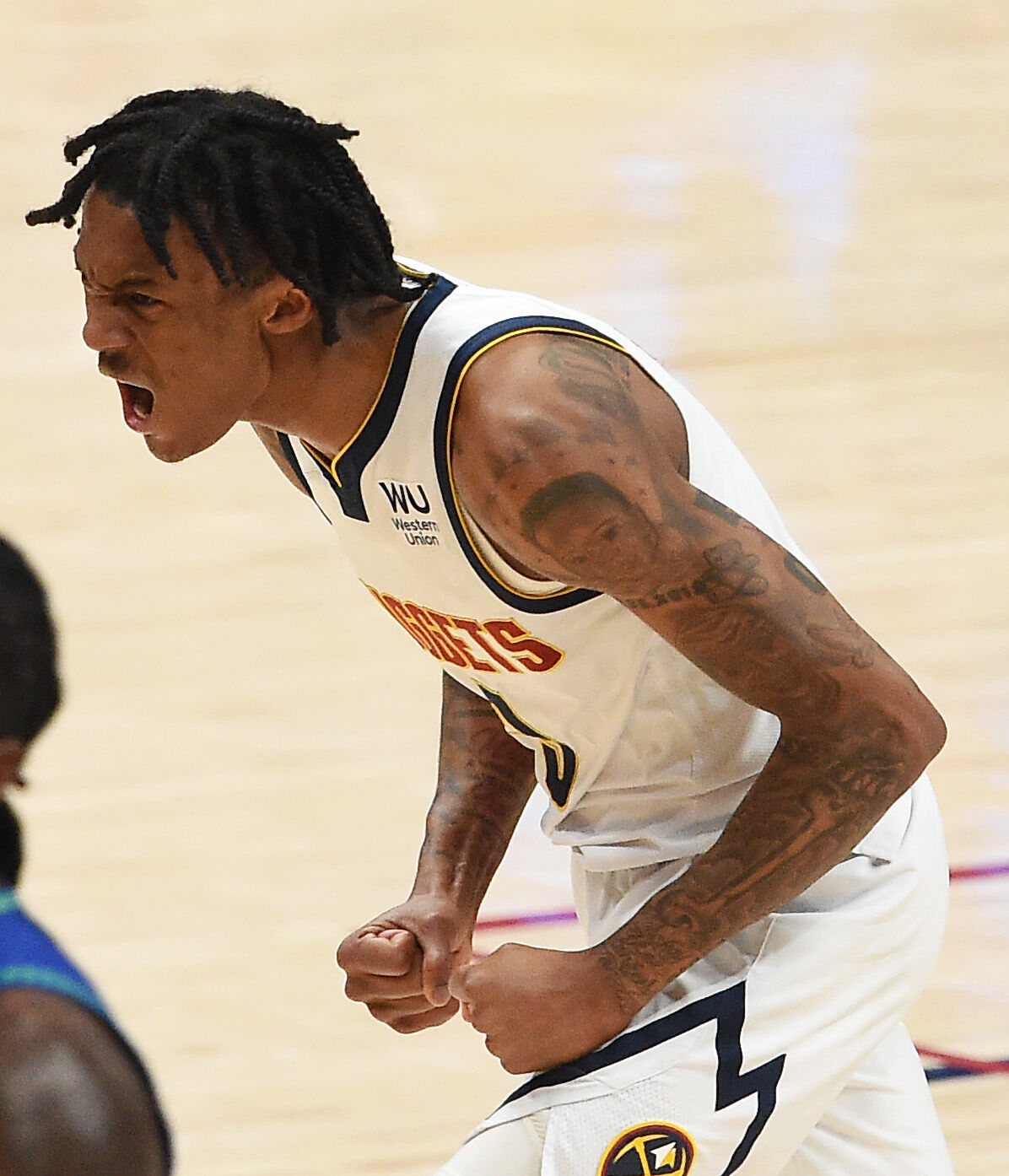 Nuggets rookie Bones Hyland celebrates a 3-pointer April 1 against the Timberwolves. (Jerilee Bennett, The Gazette)