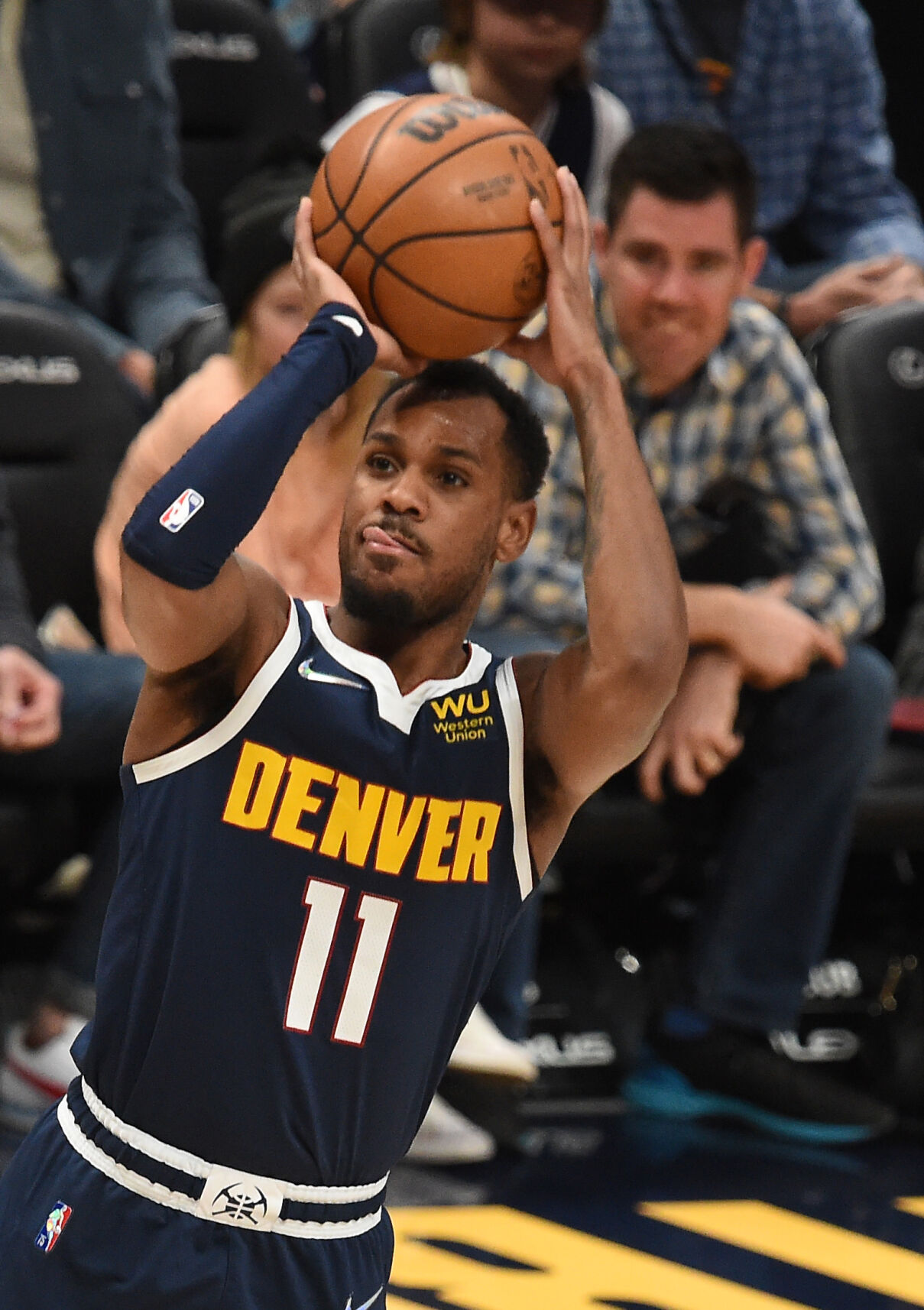 Nuggets Monte Morris takes a shot during a game at Ball Arena on Sunday, March 20, 2022. The Nuggets were pounded by the Celtics 124-104. (Photo by Jerilee Bennett, The Gazette) (Jerilee Bennett)