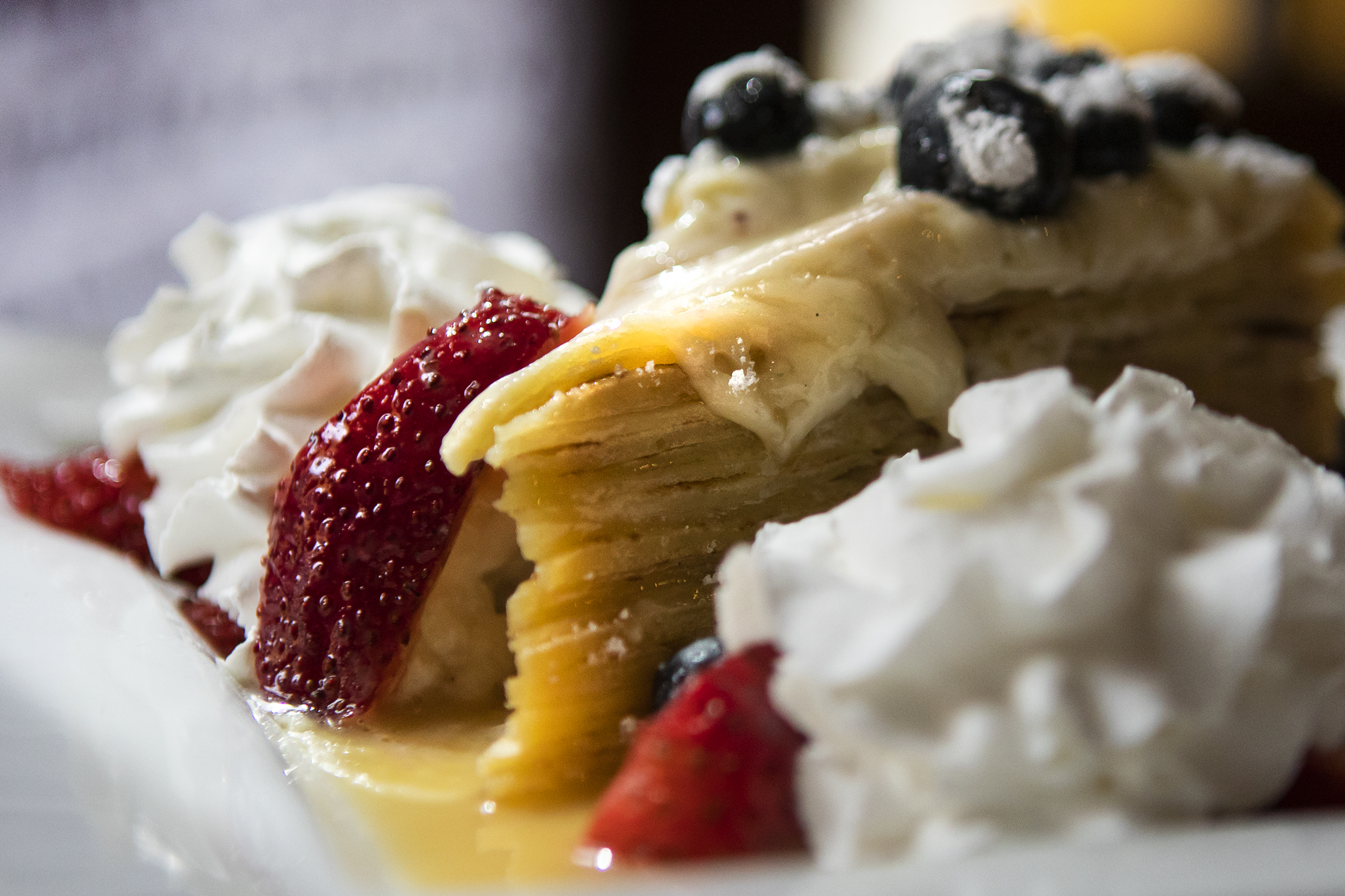 The butter rum caramel crêpe cake is a stack of crêpes that blurs the line between breakfast and dessert at Foolish Craig’s Cafe in Boulder. (Timothy Hurst, the gazette)