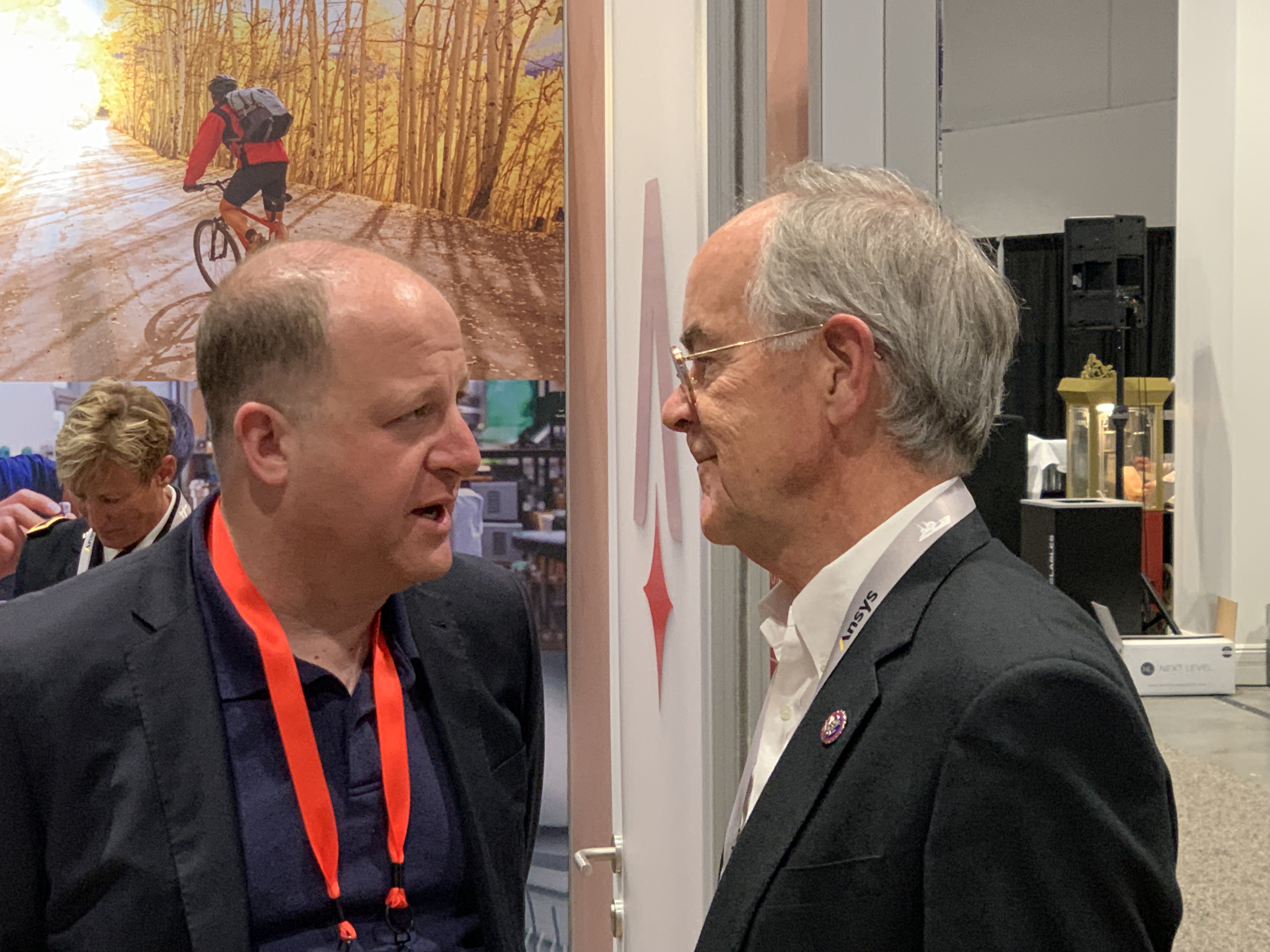Colorado Gov. Jared Polis meets with U.S. Rep. Jim Cooper, D-Tenn. at the 37th Space Symposium in Colorado Springs Tuesday. Cooper heads a house panel that oversees military space programs. (DENNIS HUSPENI/THE DENVER GAZETTE)