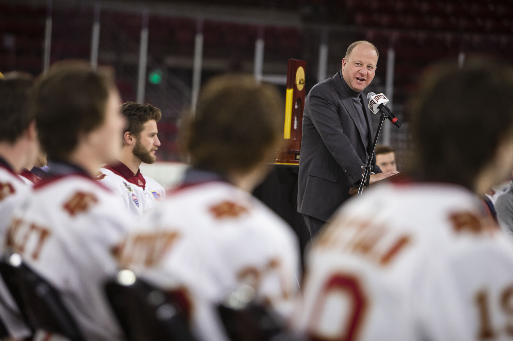 Gov. Jared Polis speaks during the 2022 National Championship Celebration for the University of Denver Men’s Hockey Team on Tuesday, April 12, 2022, at Magness Arena in Denver, Colo. (Timothy Hurst/The Denver Gazette) (Timothy Hurst, The Denver Gazette)