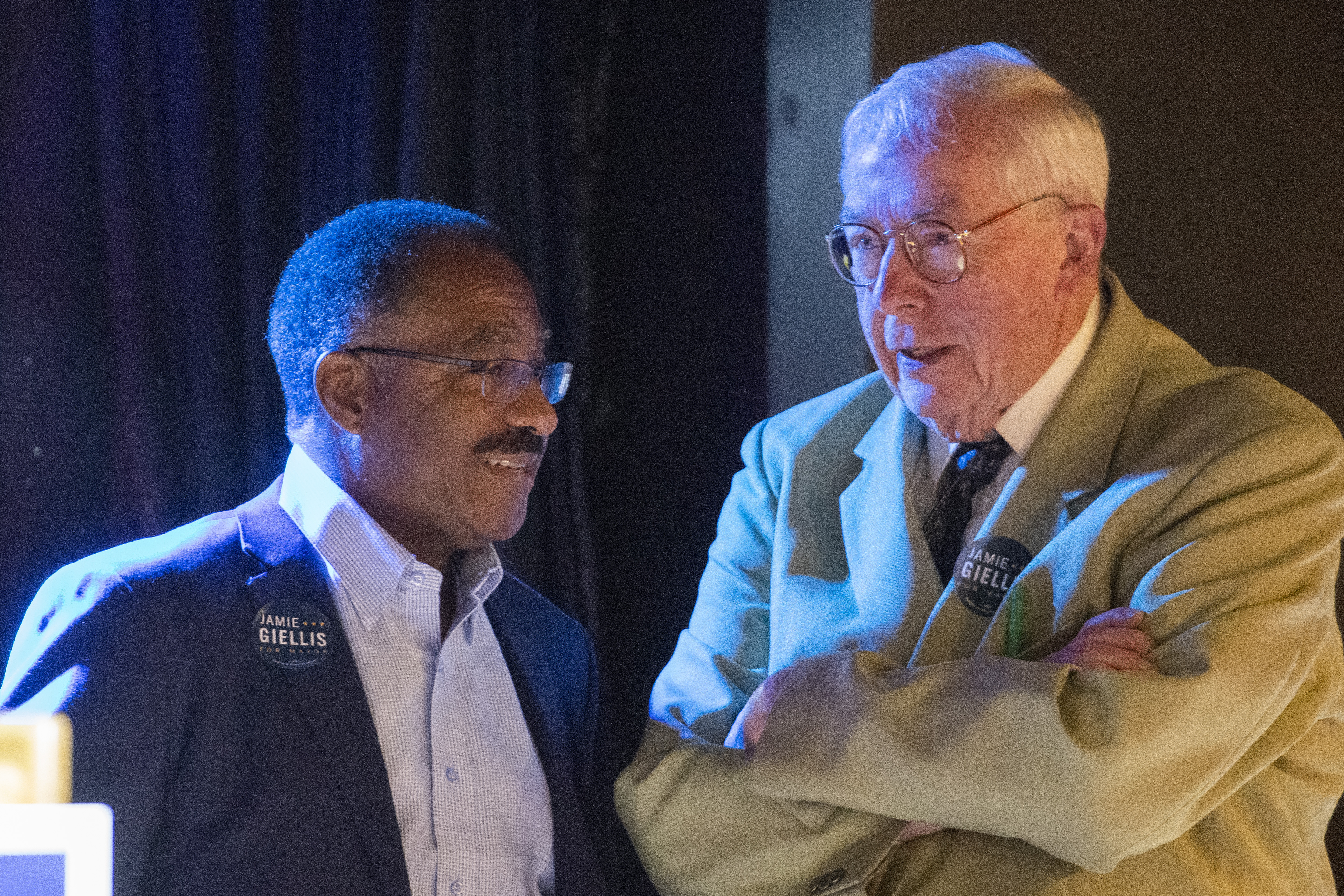 Former Denver mayoral candidate Penfield Tate, left, speaks with Dennis Gallagher, former Denver city auditor and city councilman, during the watch party for Denver mayoral runoff candidate Jamie Giellis at Ophelia's Electric Soapbox on June 4, 2019 in Denver. Photo by Andy Colwell, special to Colorado Politics (Andy Colwell)