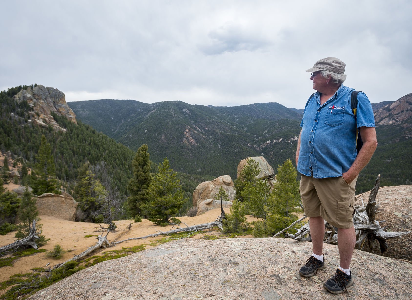 Stewart Green, with an extensive resume of climbs from all over the world, pauses as he looks at the view from the Gray Back Peak trail in Colorado Springs. (Gazette file)