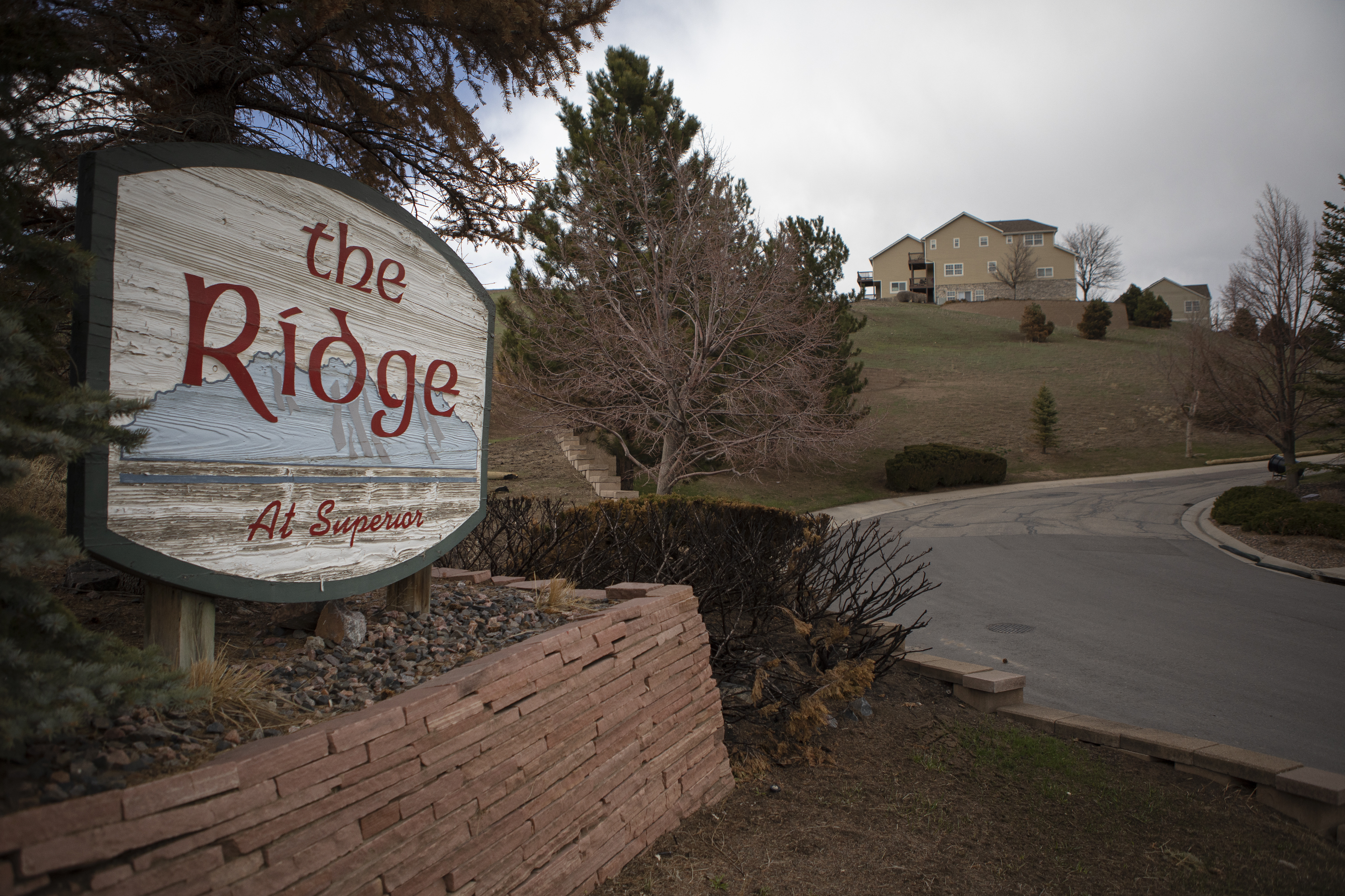 The sign leading to The Ridge at Superior Townhomes neighborhood can be seen among her neighbors’ homes on Wednesday, March 30, 2022, in Superior, Colo. (Timothy Hurst/The Denver Gazette) (Timothy Hurst)