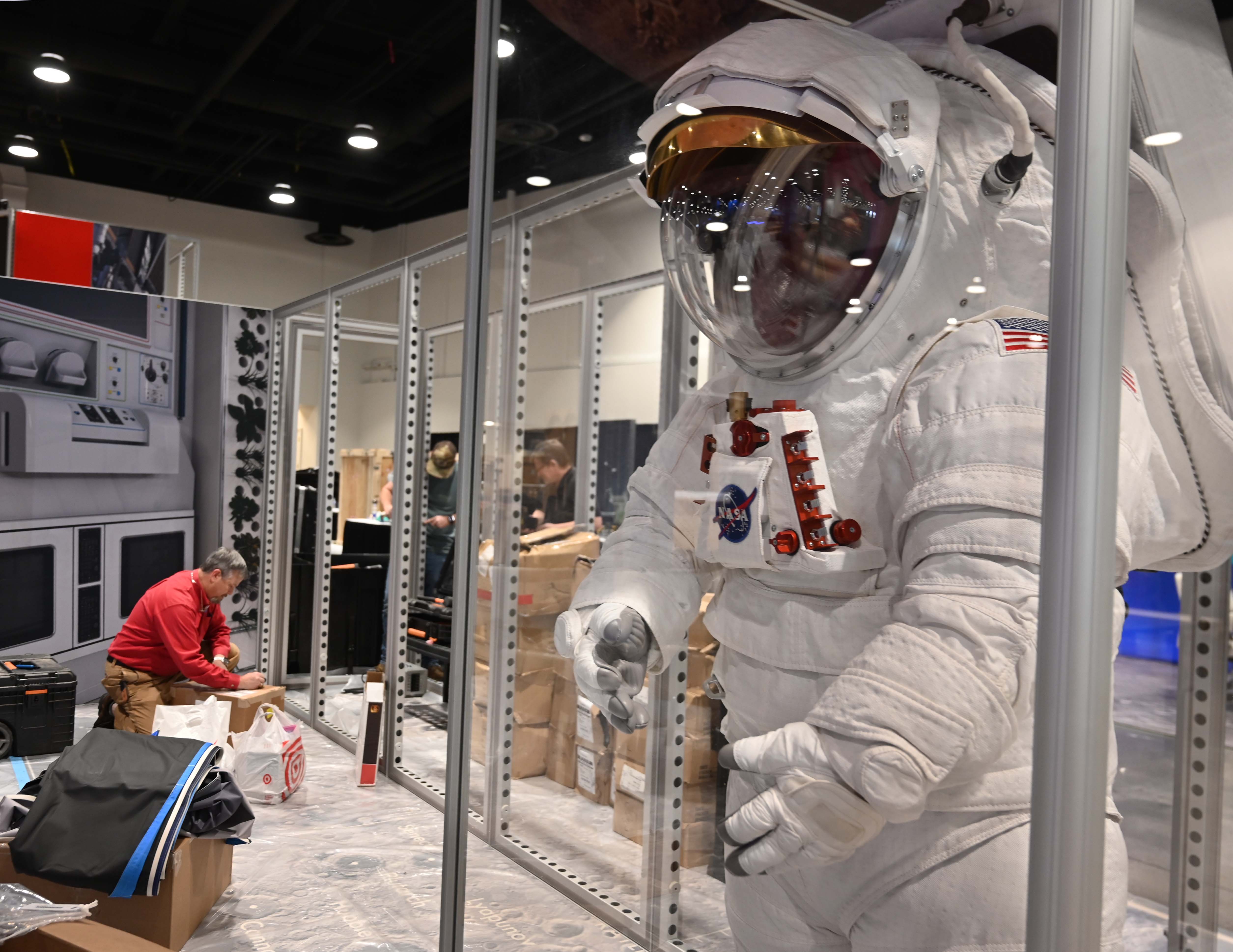 A spacesuit is on display that will be used by NASA's Artemis program, which aims to return humans to the moon in just a few years. Crews were working at the NASA display the day before the opening of the 37th Space Symposium at the Broadmoor on Sunday, April 3, 2022. (Photo by Jerilee Bennett, The Gazette) (Jerilee Bennett, The Gazette)