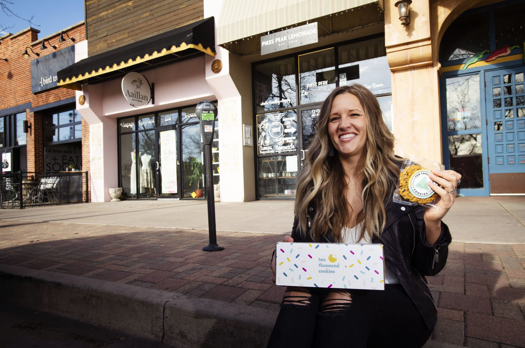 Ashley Greeno started selling cookies in hopes to raise money to adopt a baby. Her goal of selling 10,000 cookies was reached just 18 months after launching her cookie business. But after years of waiting and frustration, she and her husband decided not to renew their adoption and foster care licenses. (photos by Chancey Bush, The Gazette)