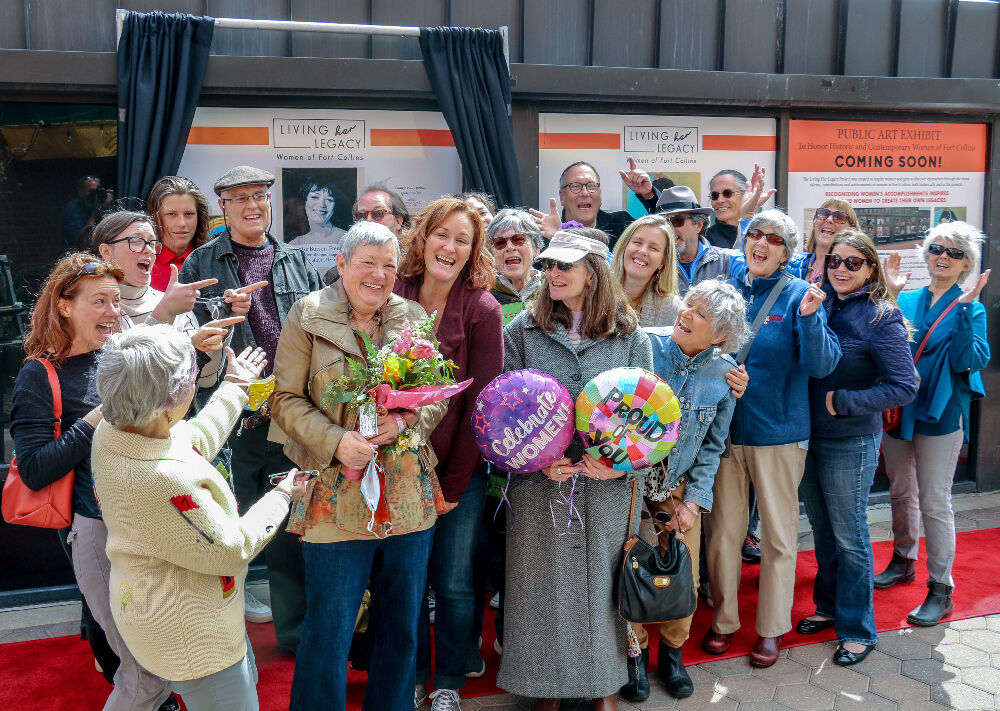 Denise Freestone is surrounded by well-wishers at her induction ceremony into the inaugural class of 'Living Her Legacy' on Sunday in Fort Collins. (JOHN MOORE)