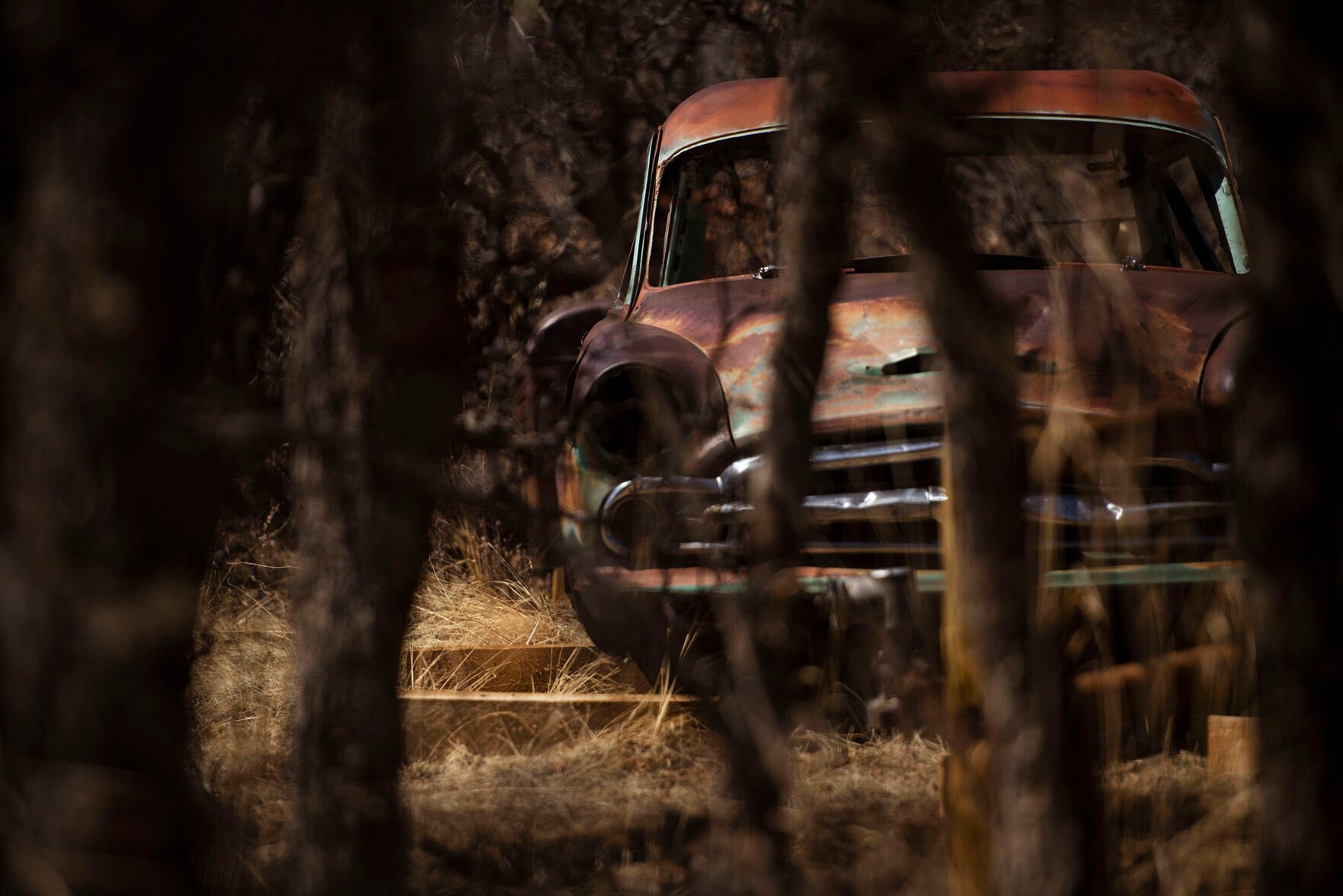 Former rancher Herman Kyle's abandoned 1953 Plymouth Coronet can be seen on the Far View Trail at the Santa Fe Open Space in Palmer Lake on Thursday, April 7, 2022. El Paso County Parks newest open space spans 65 acres below the southern slopes of Ben Lomand Mountain. (Chancey Bush/ The Gazette) (Chancey Bush/ The Gazette)