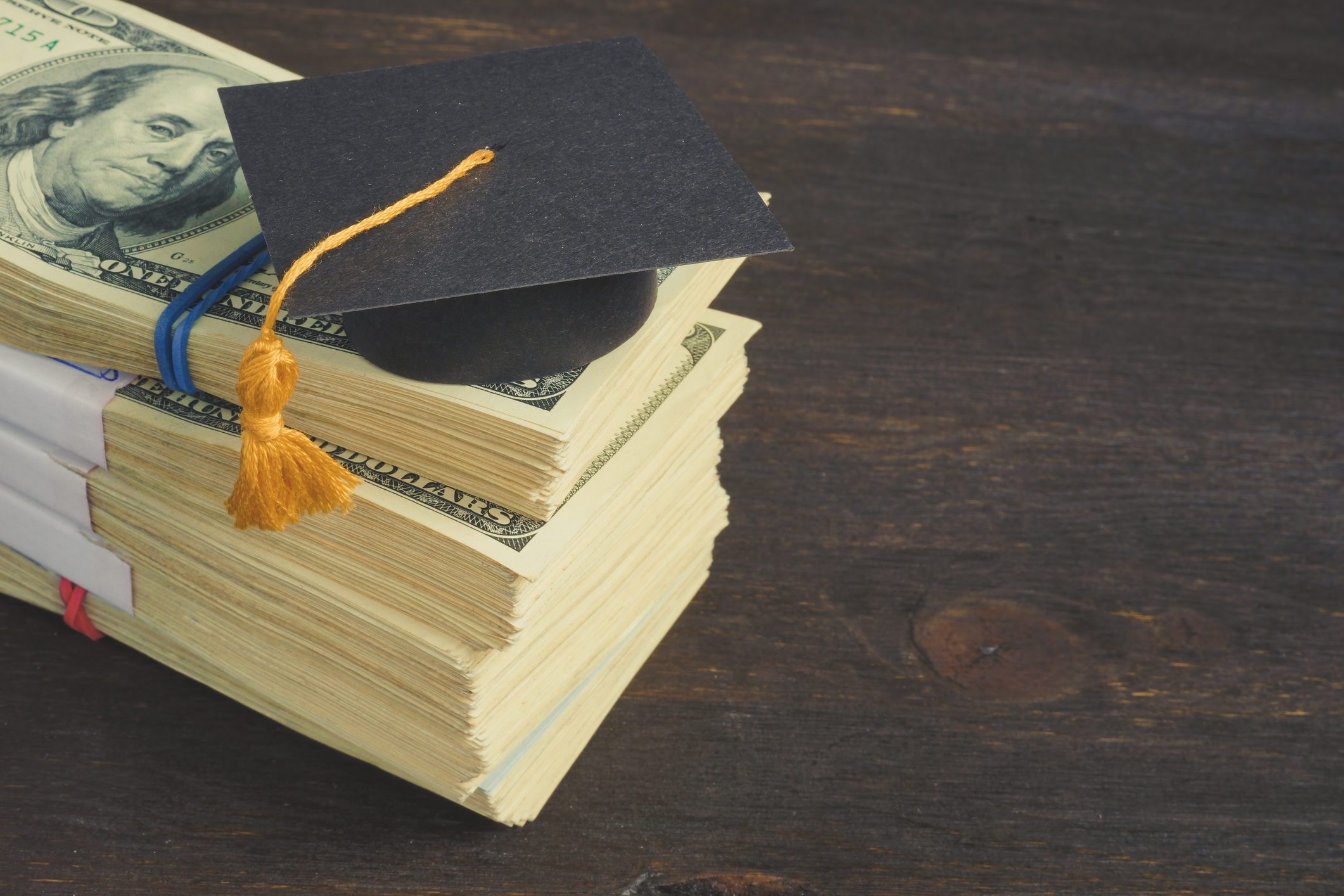Polis signs bill banning Colorado colleges, universities from withholding diplomas over student debt