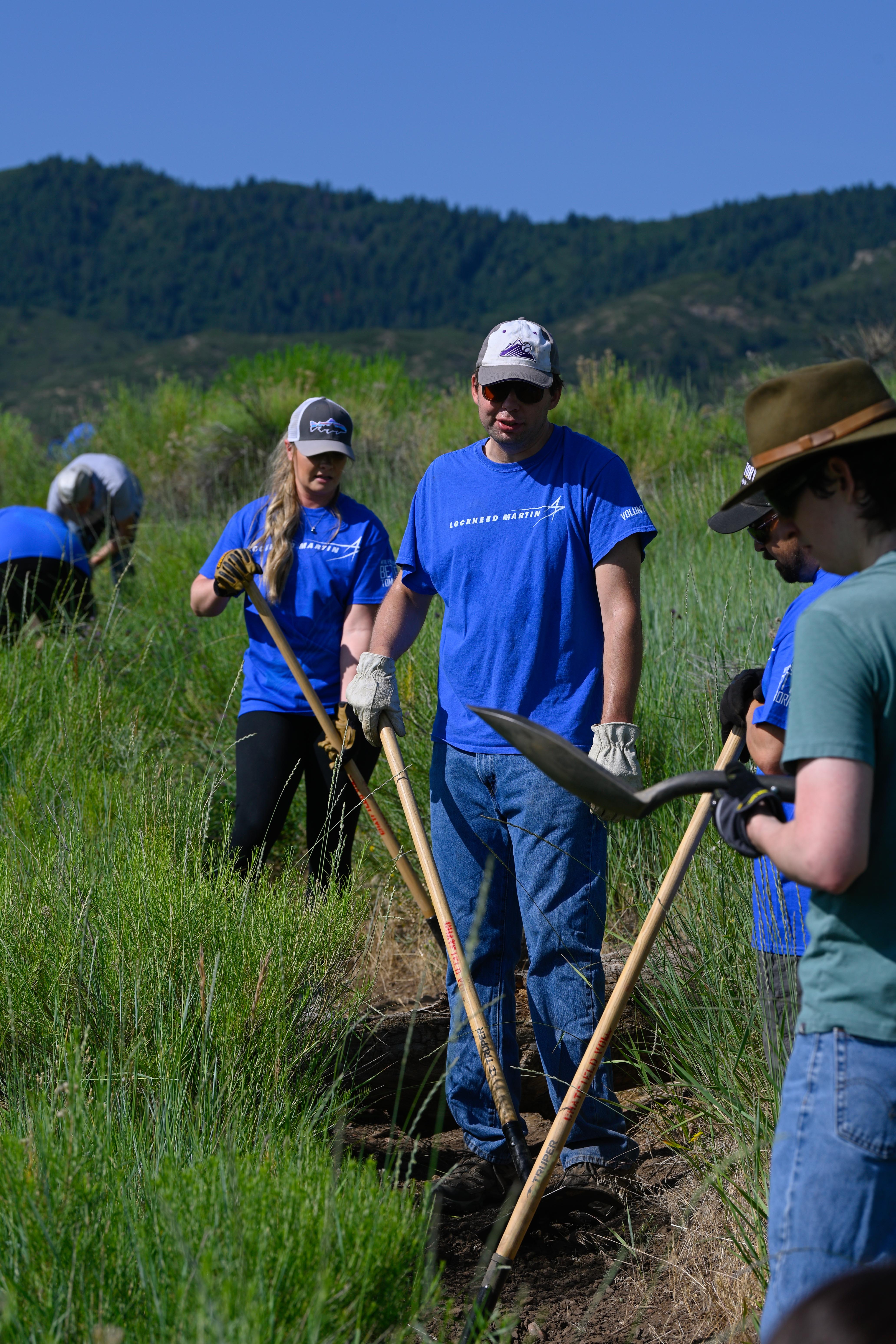 Lockheed Martin employees volunteer alongside Volunteers for Outdoor Colorado to improve Colorado trails. (Courtesy of Lockheed Martin/Dusty Volkel)
