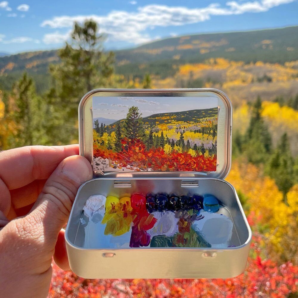 Boulder-based artist Remington Robinson paints miniature plein air murals inside Altoids boxes. (Contributed photo)