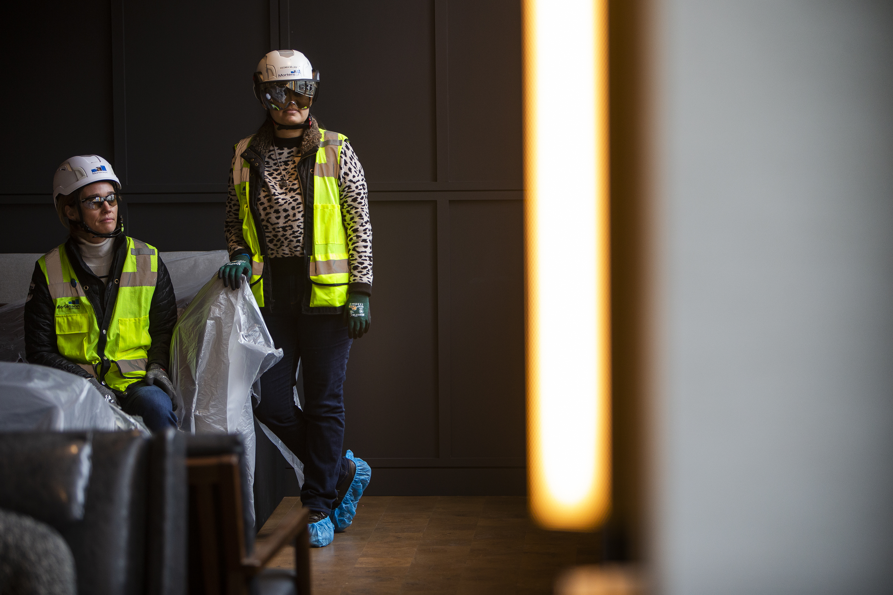 Mortenson Construction senior vice president Maja Rosenquist, left, and Craft Resource Manager Kedmia Milam pose for a portrait in a dining area at The Slate Denver hotel construction site at the Emily Griffith Hotel Redevelopment site on Thursday, March 17, 2022, in Denver. (Timothy Hurst/The Denver Gazette) (Timothy Hurst/The Denver Gazette)