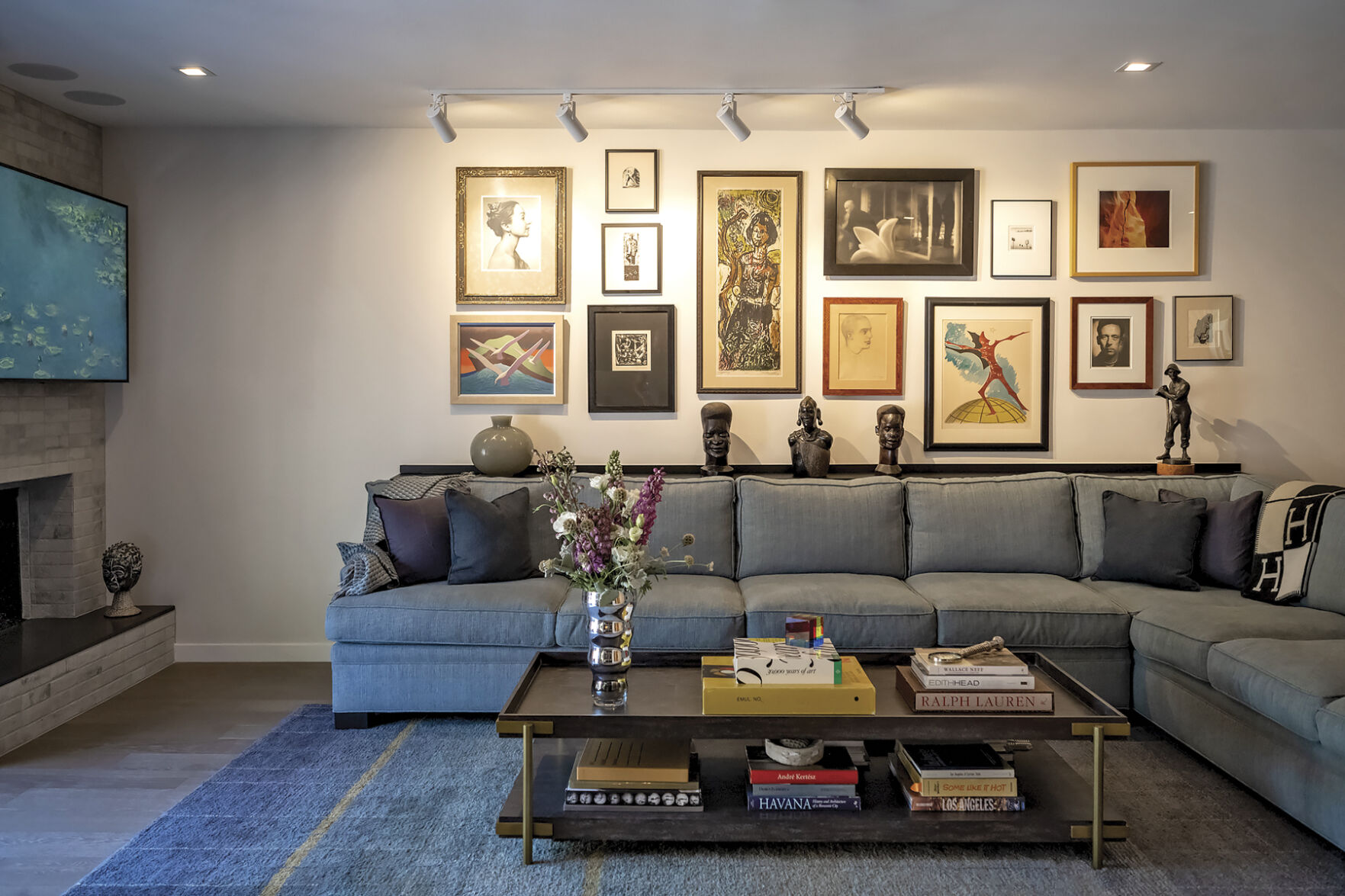 When Hollywood PR maven Howard Bragman downsized, he hired interior designer Christopher Grubb to help him pare down a vast art collection and repurpose key pieces into a curated gallery wall. (Courtesy photos)