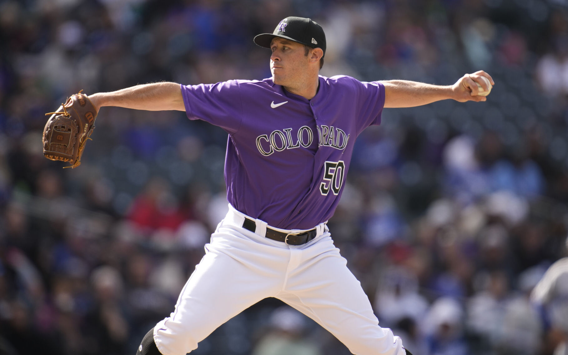 Colorado Rockies relief pitcher Ty Blach works against the Los Angeles Dodgersin the ninth inning of a baseball game Sunday, April 10, 2022, in Denver. (AP Photo/David Zalubowski) (David Zalubowski)