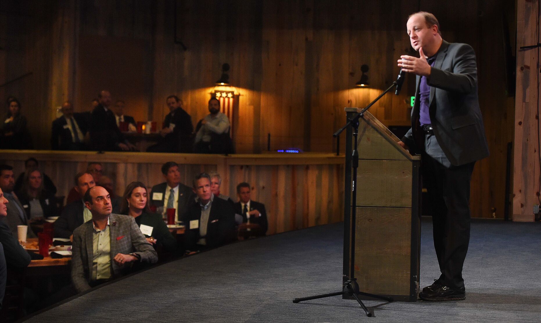 Gov. Jared Polis gave his State of State address in Colorado Springs at the Boot Barn Hall at Bourbon Brothers on Jan. 19. (Jerilee Bennett, Gazette file)