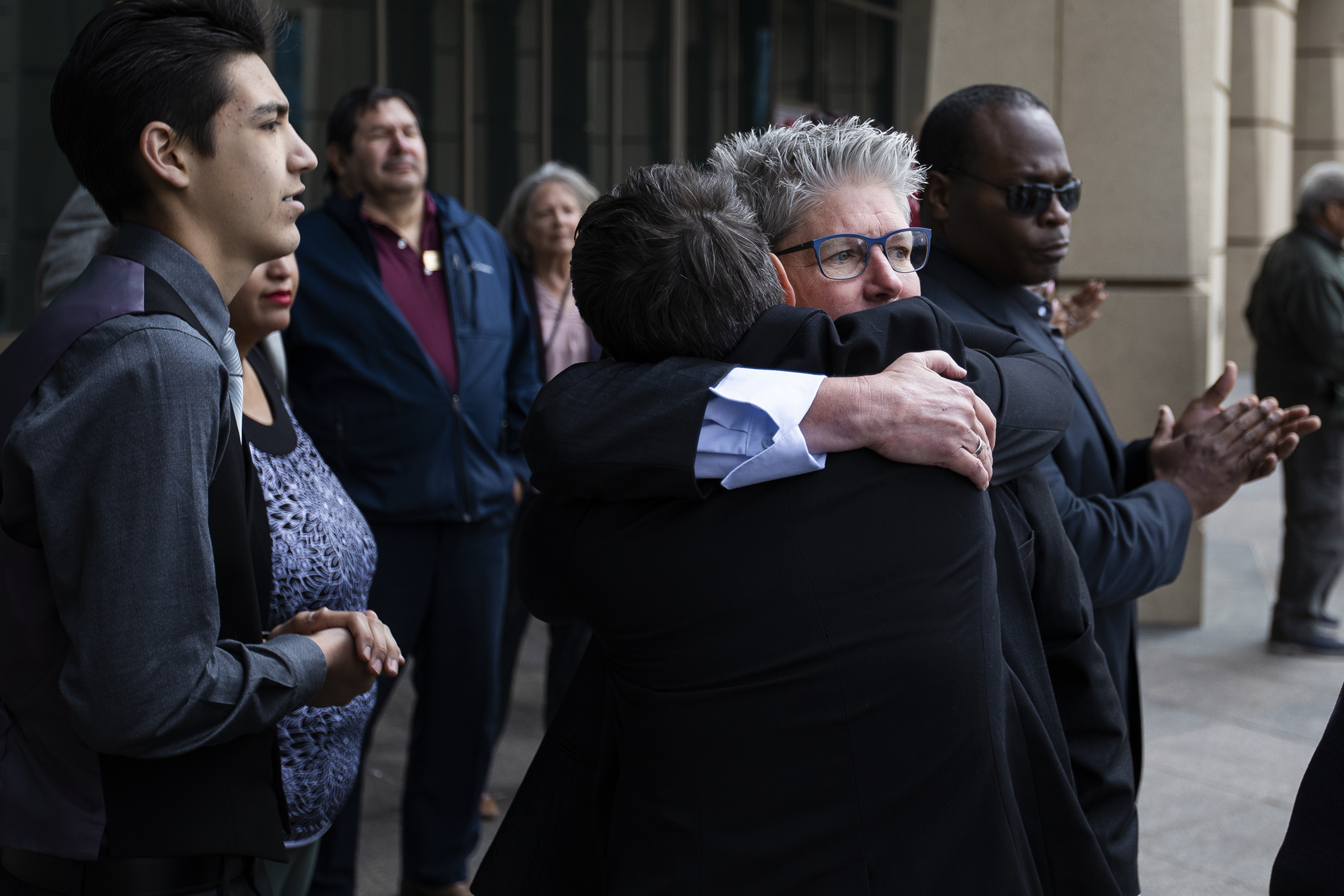 Former Aurora police chief Vanessa Wilson, center-right, hugs her partner Robin Niceta after speaking at a press conference concerning Wilson’s recent firing, as seen on Monday, April 11, 2022, at the Aurora Municipal Center in Aurora, Colo. (Timothy Hurst/The Denver Gazette) (Timothy Hurst)