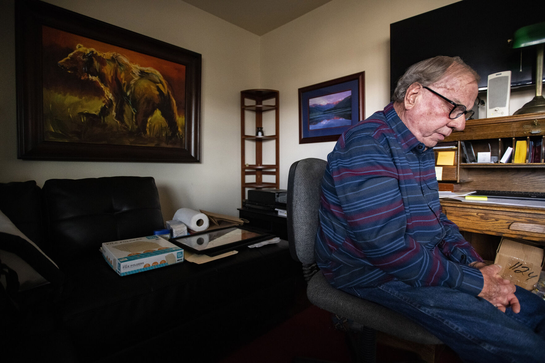 Gene Estes takes a moment to himself while talking at his Crested Butte condo Thursday, May 5, 2022, about the memories he had with his son, Shayn Estes, before his death in 2022. Gene found his son dead Oct. 17, 2020, from an overdose and believes benzodiazepines are responsible. (The Gazette, Christian Murdock) (Christian Murdock/The Gazette)